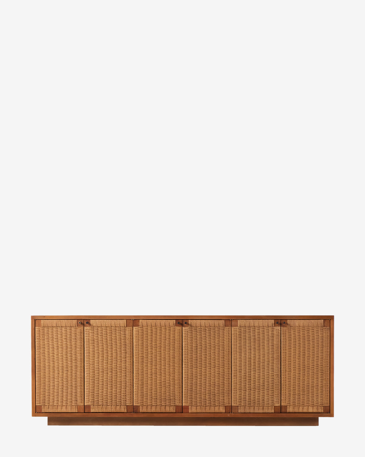 The Ackerman Sideboard by Four Hands features six doors with woven rattan and mahogany veneer, combining minimalist design and natural textures against a plain white background by Vendixs