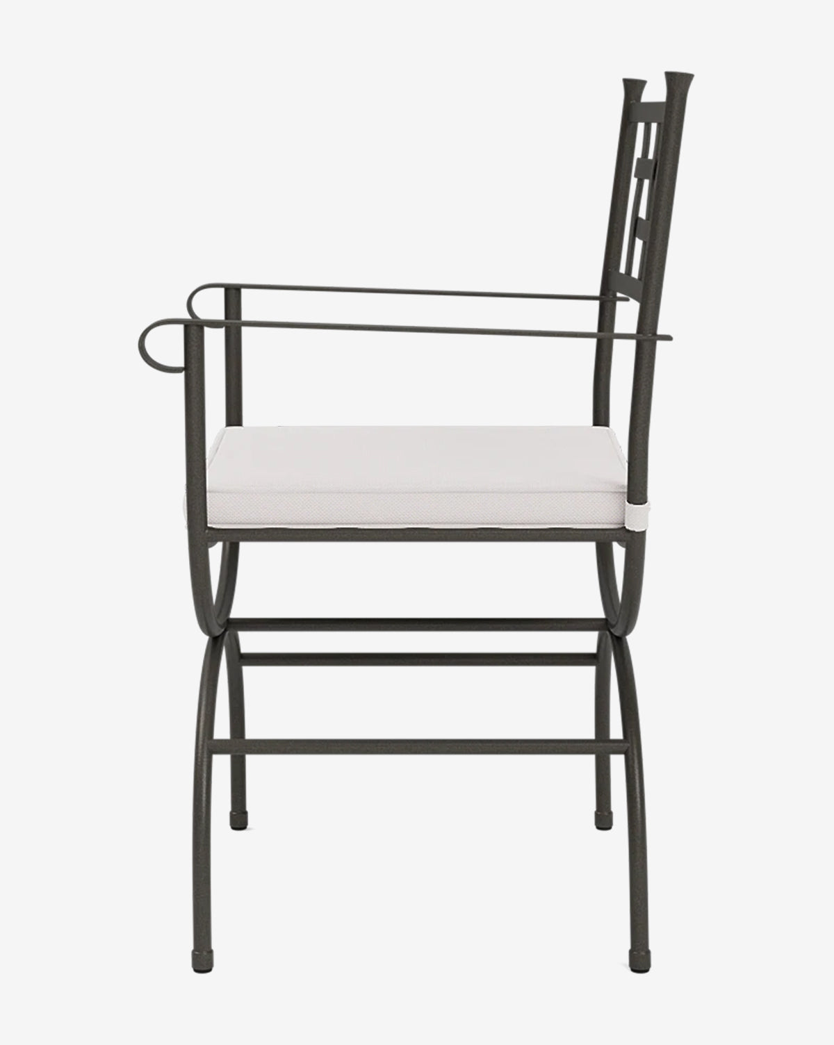 The Addie Outdoor Chair features a black metal frame, straight armrests, a footrest, and a square white performance fabric cushion, by Vendixs Its minimalist and modern design makes it ideal for patio dining.