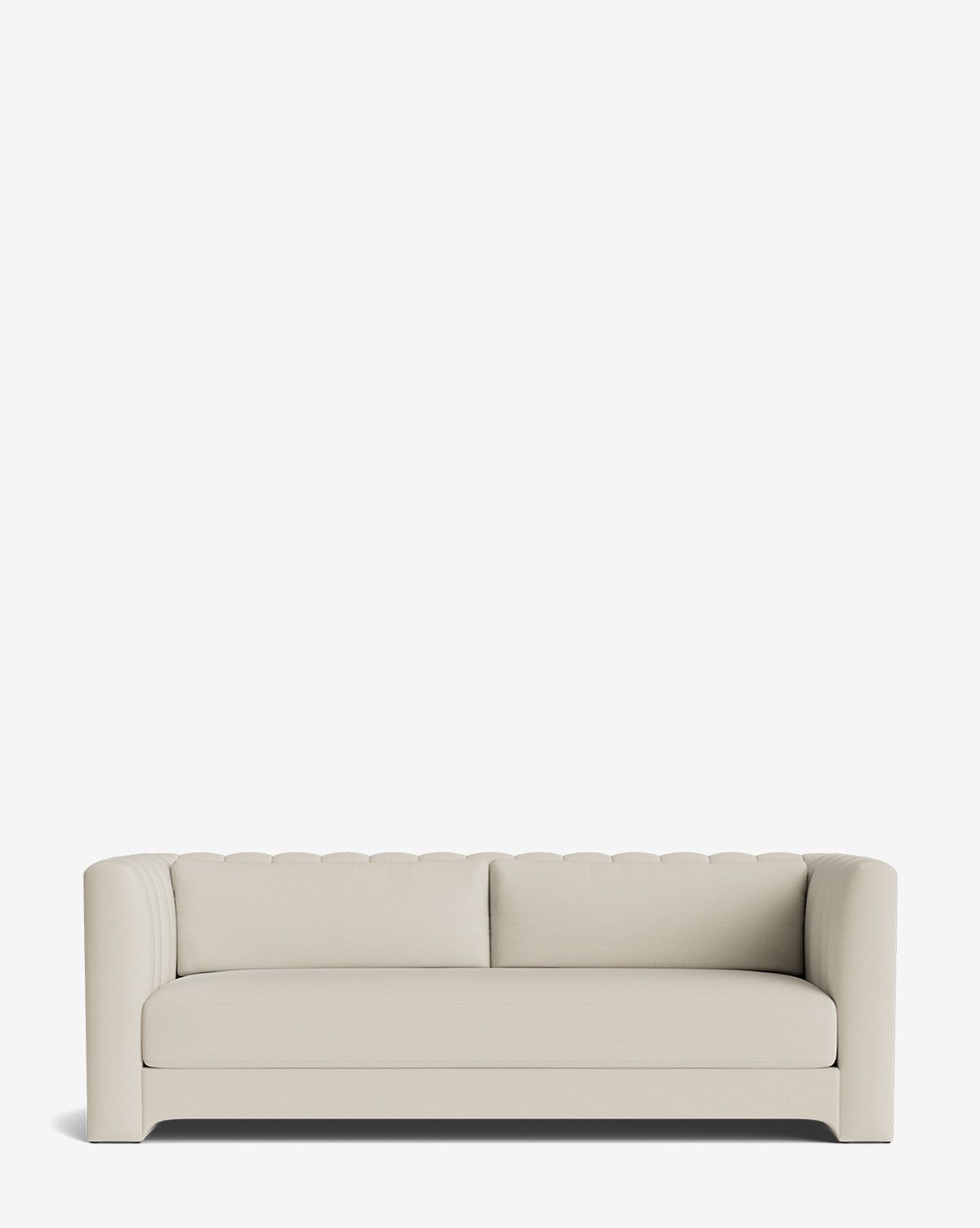 The Agatha Sofa 90 is a modern, light beige handcrafted sofa with a low back and equal-height armrests, subtle vertical stitching on the backrest, and clean lines on the base, all set against a plain white background, by Vendixs