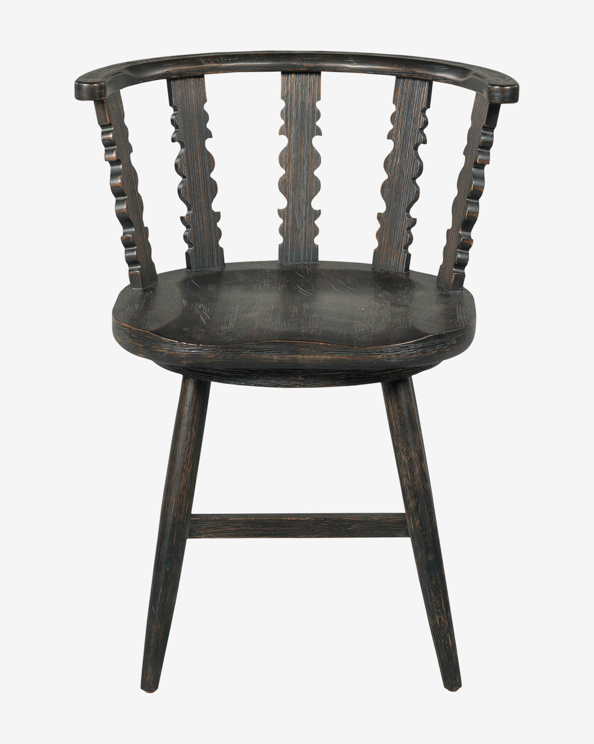 The Woodbridge Alaric Dining Chair has a dark oak frame, curved backrest with three slats, turned side supports, angled legs, and a worn black finish for a charming rustic appeal. Vendixs