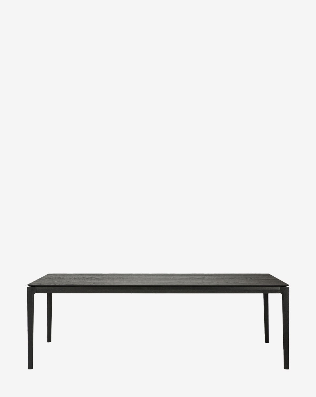 The Alec Dining Table features a minimalist black design with four slender legs, making it the ideal centerpiece to elevate any modern dining room, by McGee & Co.