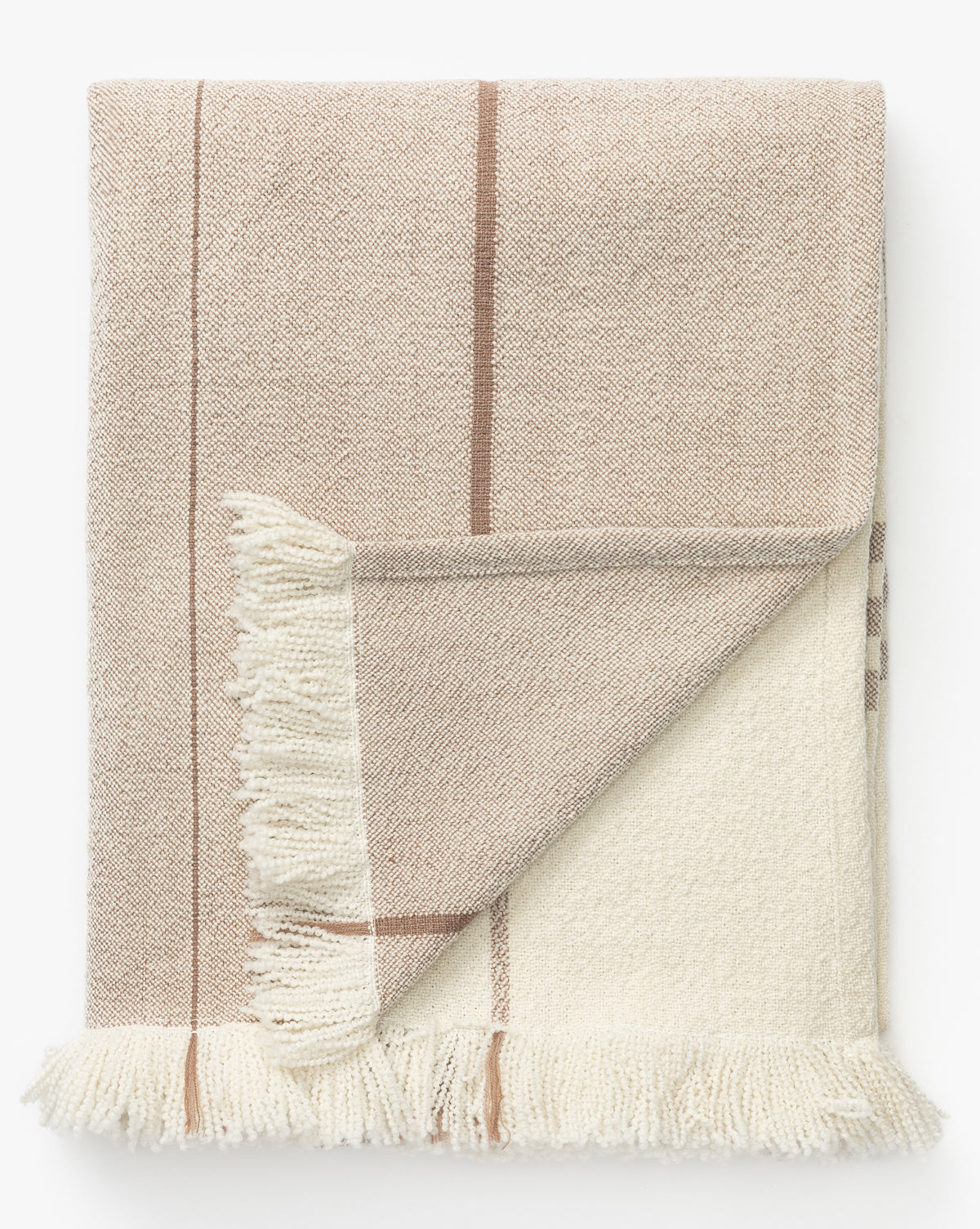 The Alex Plaid Throw by ILA HOME FASHIONS, shown folded on a white background, features a luxurious beige and cream palette with thin brown stripes and fringed edges, Vendixs