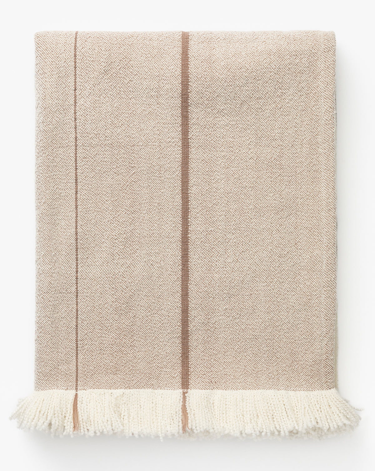 The Alex Plaid Throw by ILA HOME FASHIONS features a beige herringbone weave with a brown vertical stripe and fringed white edges, offering a neutral palette reminiscent of cozy luxury by Vendixs