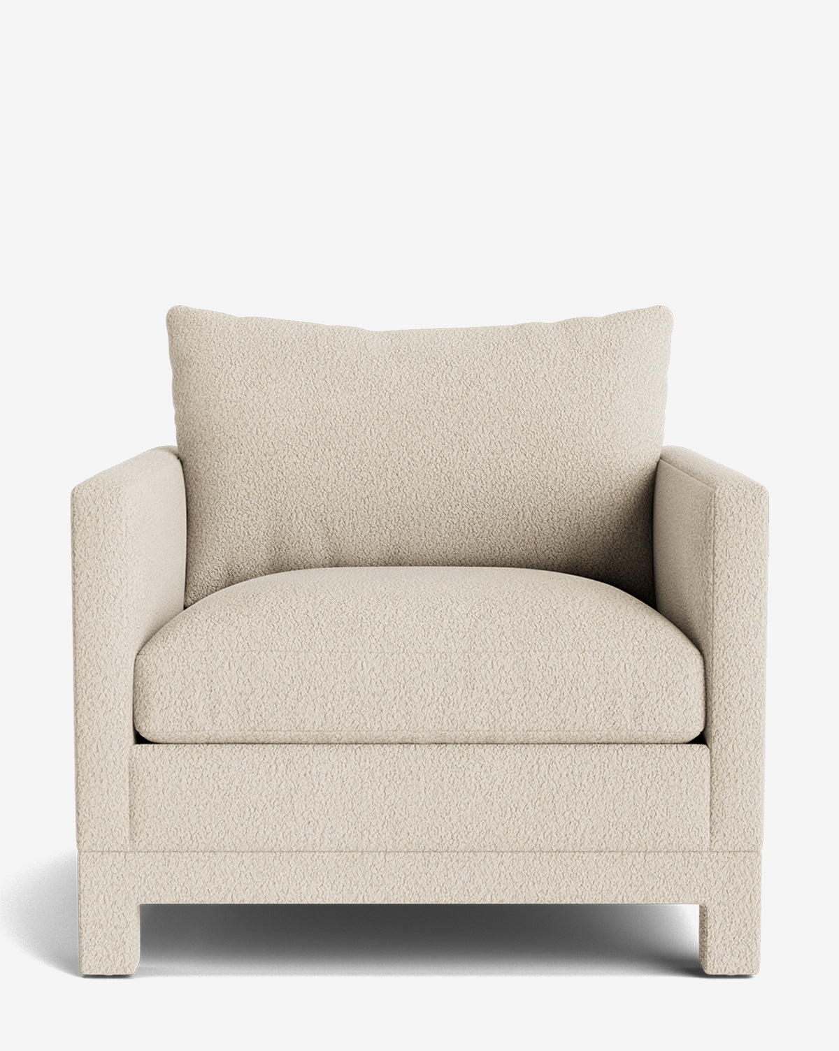 The Appoline Lounge Chair features a wide seat, thick cushion, and square arms, upholstered in soft off-white textured fabric. Part of our Upholstery Collection, it sits on low sturdy legs and is made to order for your space, by McGee & Co.