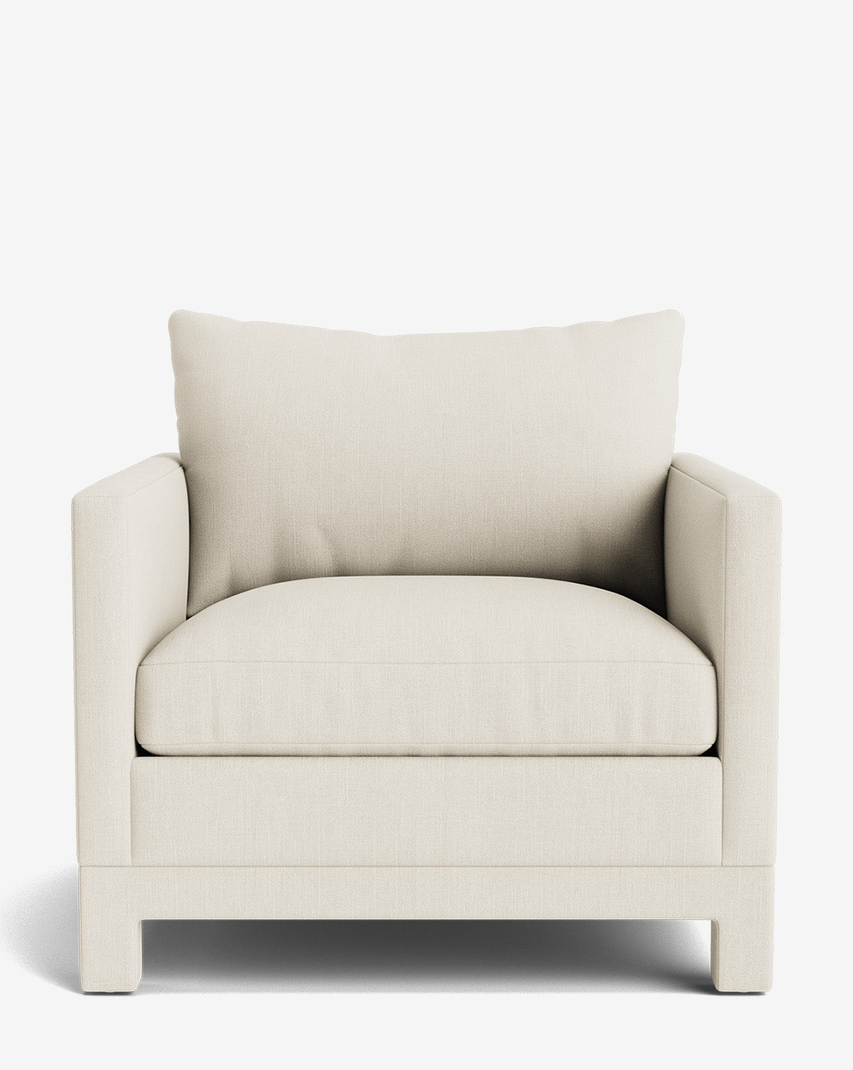 The Appoline Lounge Chair from the Upholstery Collection features thick off-white seat and back cushions, square arms, and short block legs, by McGee & Co. This modern oversized armchair is made to order and shown against a plain white background.