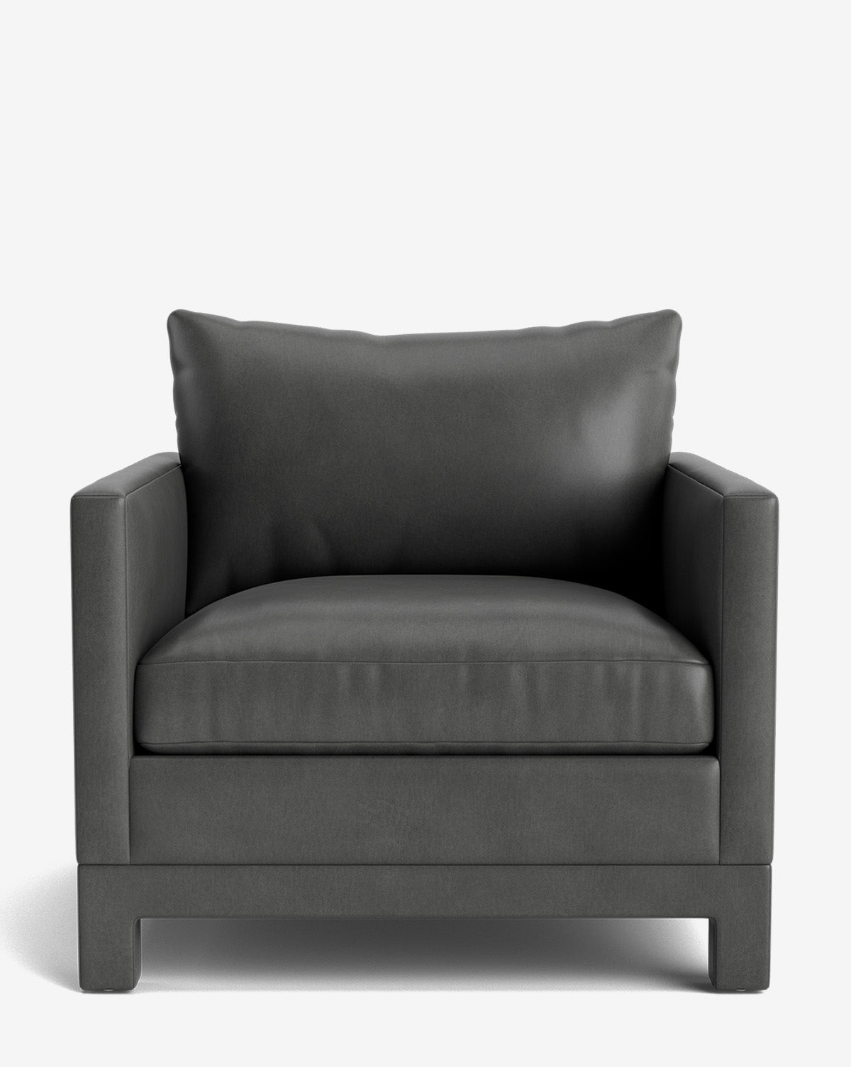 The Appoline Lounge Chair from our Upholstery Collection is a dark gray leather armchair with thick cushioning, a backrest pillow, straight armrests, and a sturdy boxy base—made to order for lasting comfort, by McGee & Co.