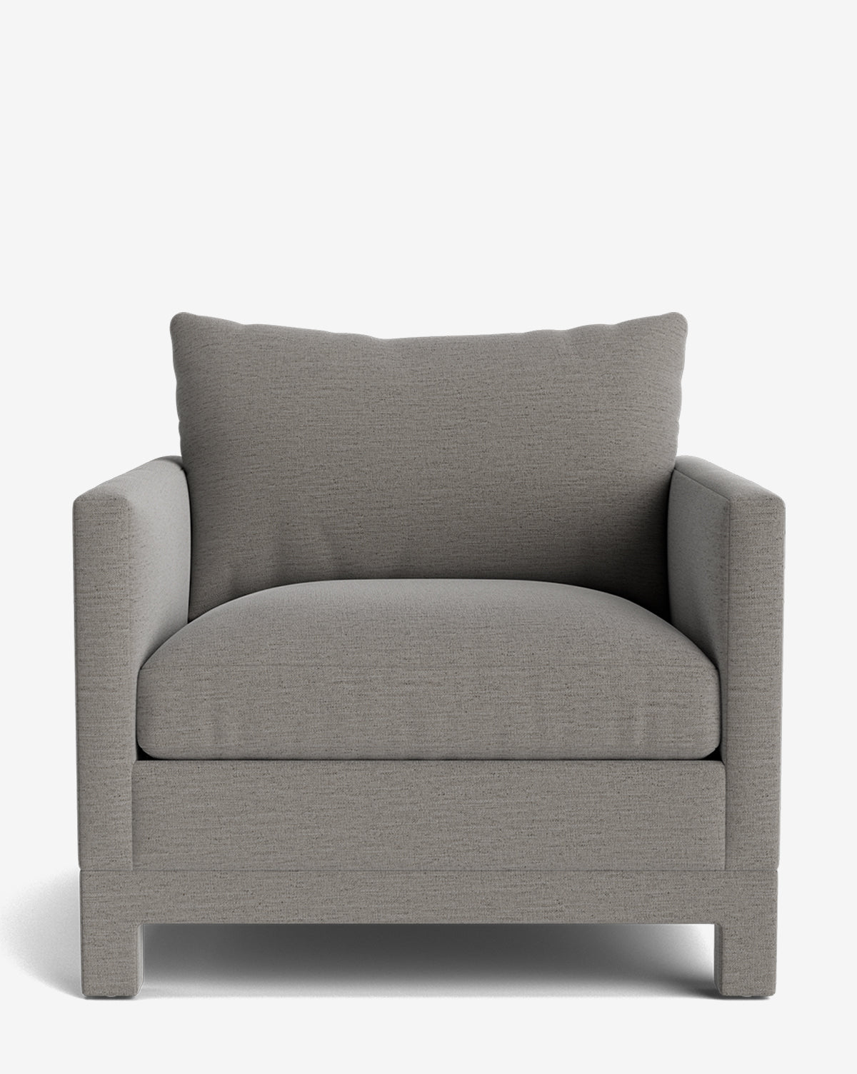 The Appoline Lounge Chair from our Upholstery Collection is a modern oversized armchair in light gray fabric with a thick seat, large cushioned back, straight armrests, and sturdy square legs. Made to order for your space by McGee & Co.