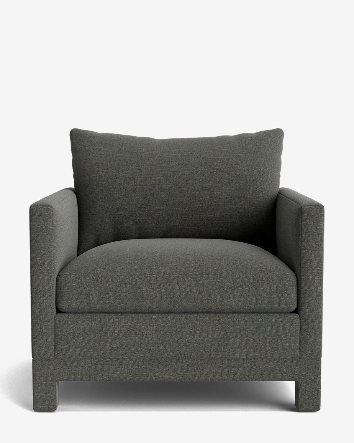The Appoline Lounge Chair from our Upholstery Collection is a dark gray, boxy armchair with a wide seat and plush cushions, made to order and shown against a plain white background by McGee & Co.
