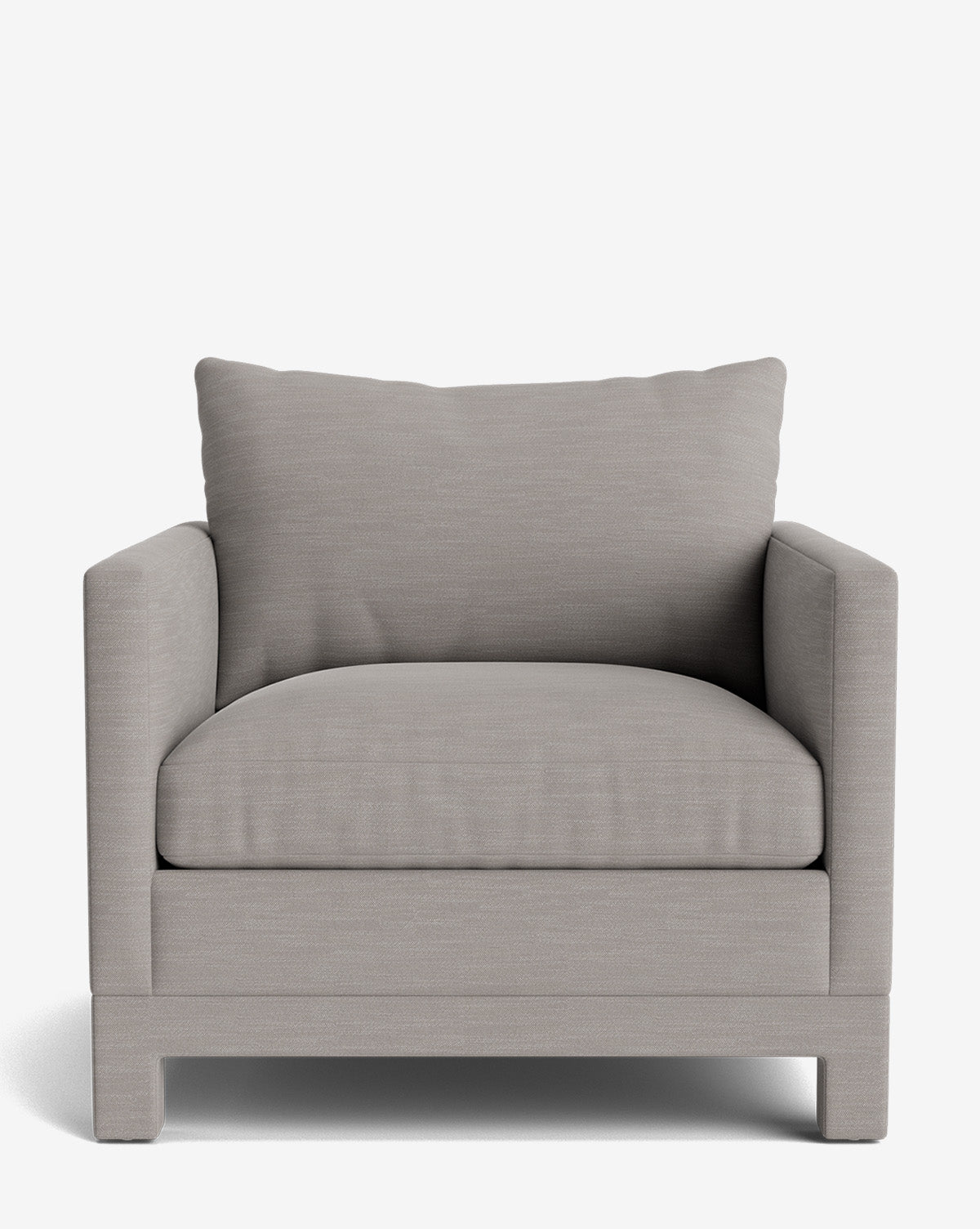The Appoline Lounge Chair from our Upholstery Collection is an oversized, made-to-order armchair in light gray fabric with wide arms, a plush seat cushion, and a matching back cushion, shown against a plain white background, by McGee & Co.