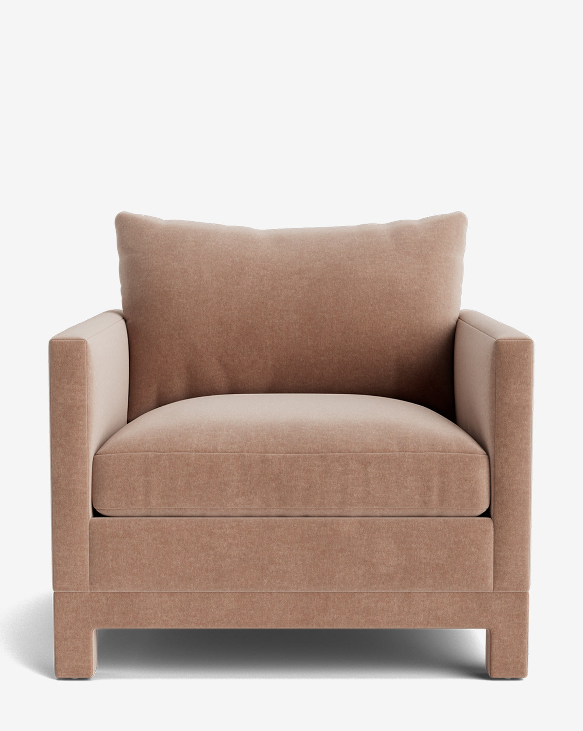 The Appoline Lounge Chair from our Upholstery Collection features light brown fabric, a boxy frame, thick seat cushion, large plush back pillow, and sturdy short legs. Made to order; shown against a white background by McGee & Co.
