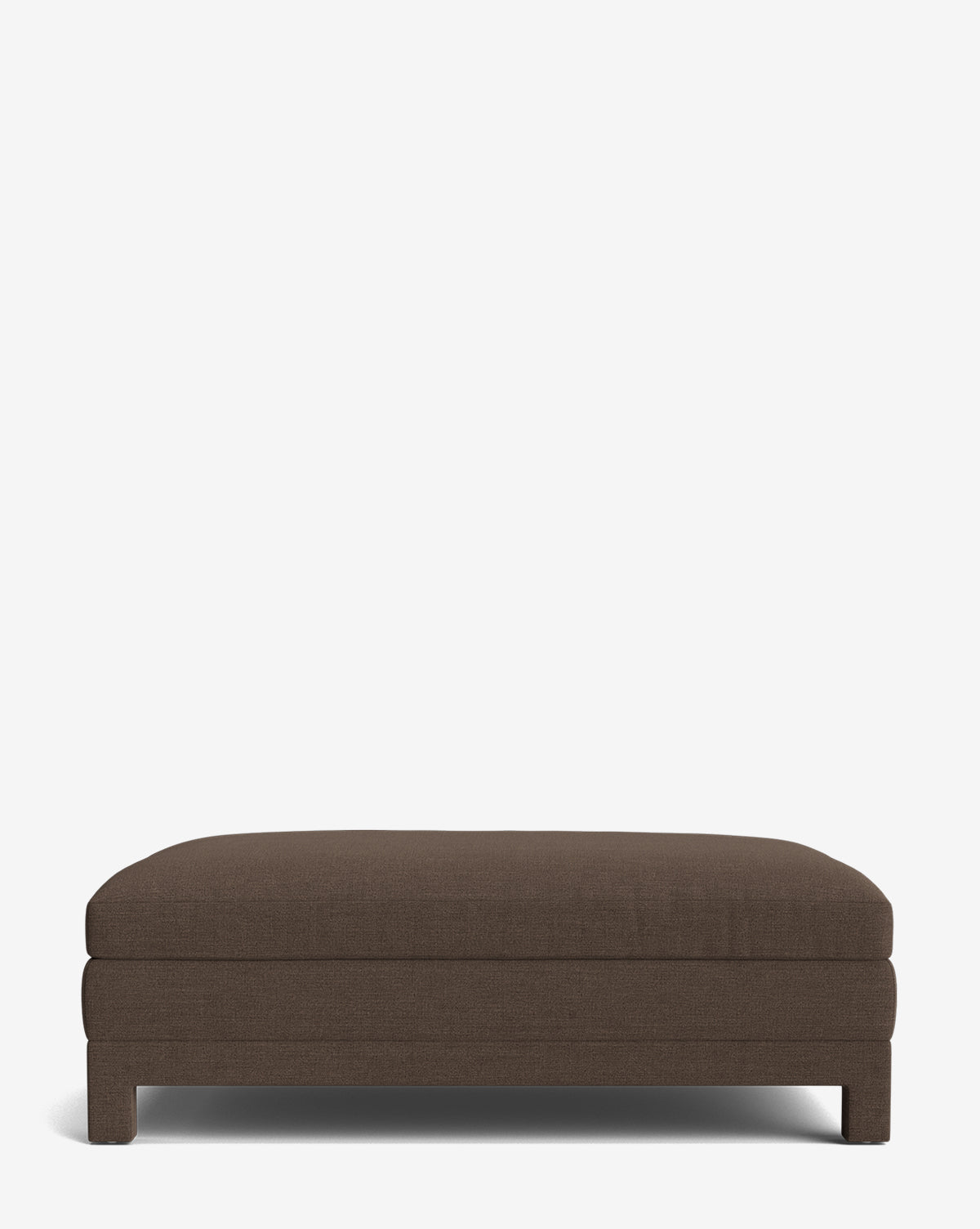 The Appoline Ottoman is a rectangular, low-profile modern piece with dark brown upholstery and short block legs, shown against a plain white background by McGee & Co.