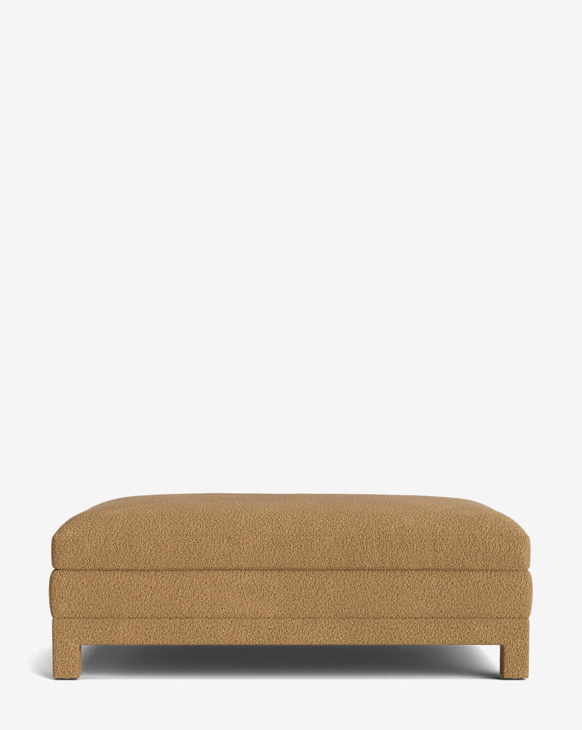 The Appoline Ottoman is a rectangular, tan upholstered piece with short square legs and plush textured fabric, viewed from the front on a white background. Its simple, modern design makes it a stylish made-to-order ottoman by McGee & Co.
