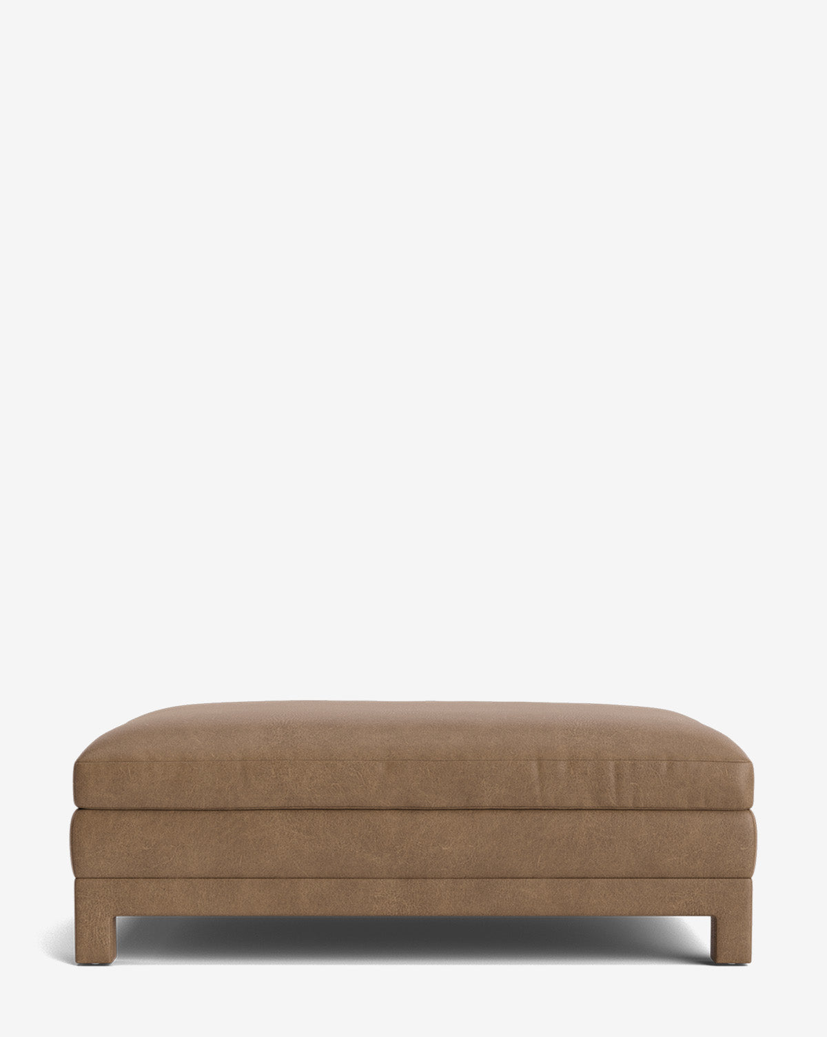 The Appoline Ottoman is a rectangular, low-profile piece with light brown upholstery, simple design, and short legs, shown against a plain white background by Vendixs