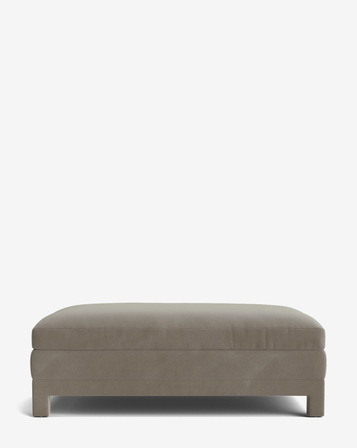 The Appoline Ottoman is a rectangular, grey upholstered piece with short legs and clean lines, shown on a plain white background. Its smooth surface and modern design blend simplicity with contemporary style, by Vendixs