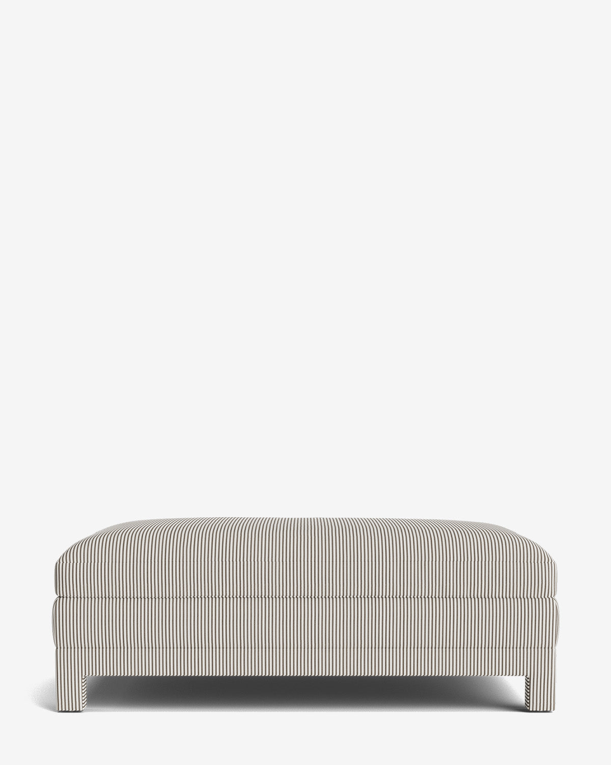 The Appoline Ottoman features thin black and white vertical stripes, short legs, and a cushioned top, shown against a plain white background by McGee & Co.