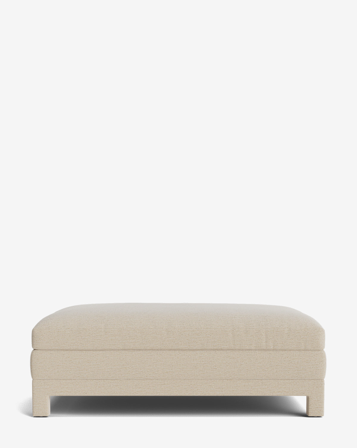 The Appoline Ottoman is a modern, rectangular piece upholstered in beige textured fabric with clean lines and a low profile, shown against a plain white background by McGee & Co.