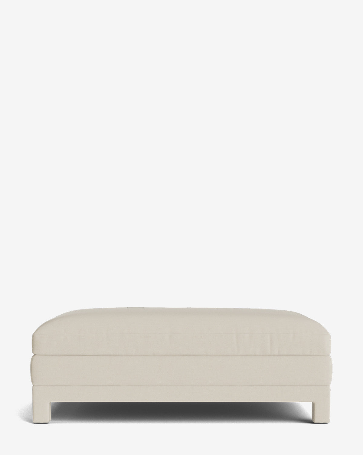 The Appoline Ottoman features a plush, off-white cushion top and low wooden legs for a sleek look, making it perfect for any space. This modern upholstered ottoman is shown against a white background by Vendixs