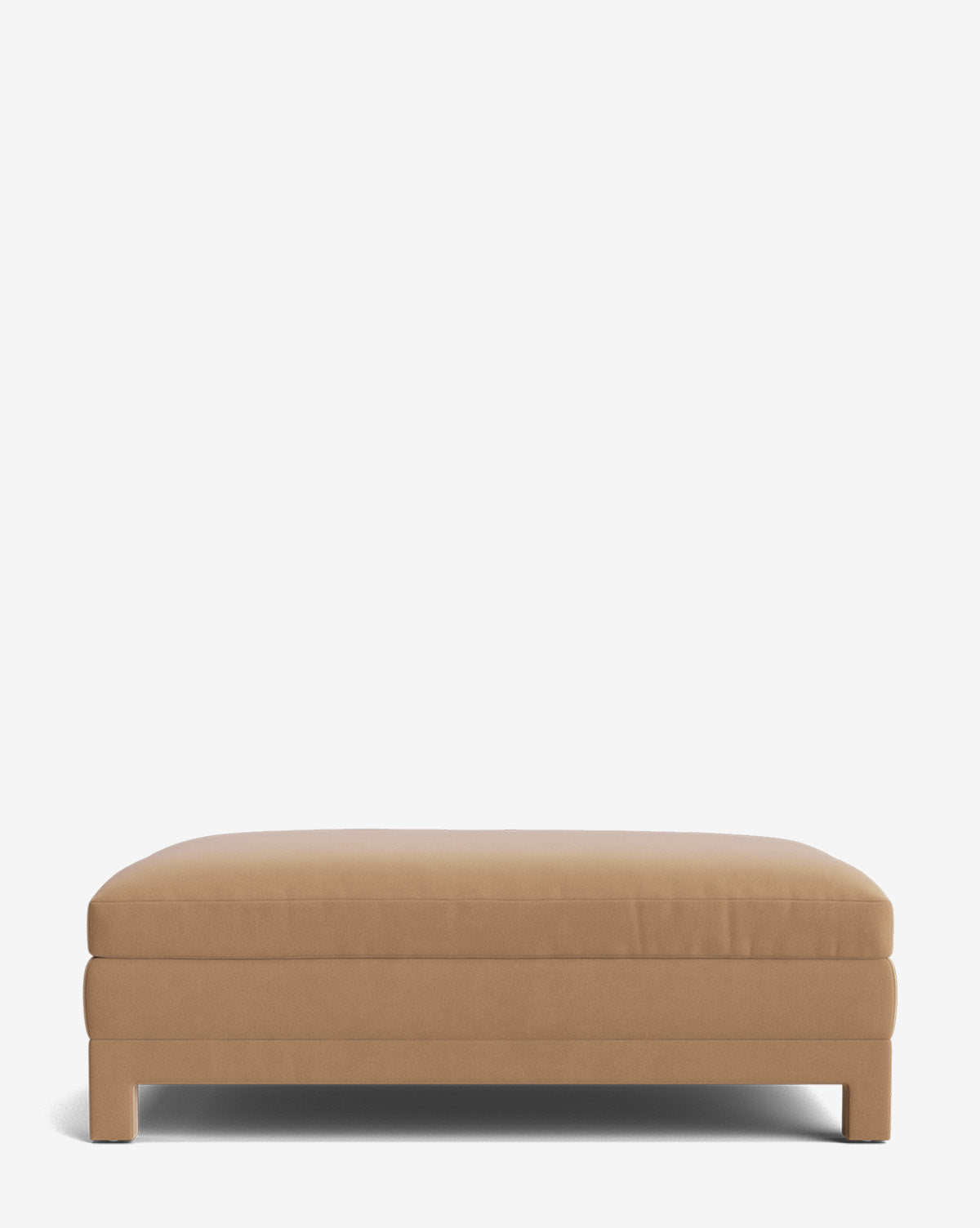 The Appoline Ottoman features a rectangular, tan upholstered design with clean lines, low legs, and minimalist style, creating a modern vibe against a plain white background, by McGee & Co.