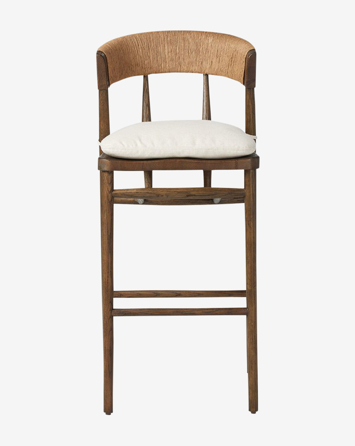Front view of the Ardent Stool by Four Hands: features an oak frame, light beige cushioned seat, and a curved natural paper rush woven backrest, shown against a plain white background. Vendixs