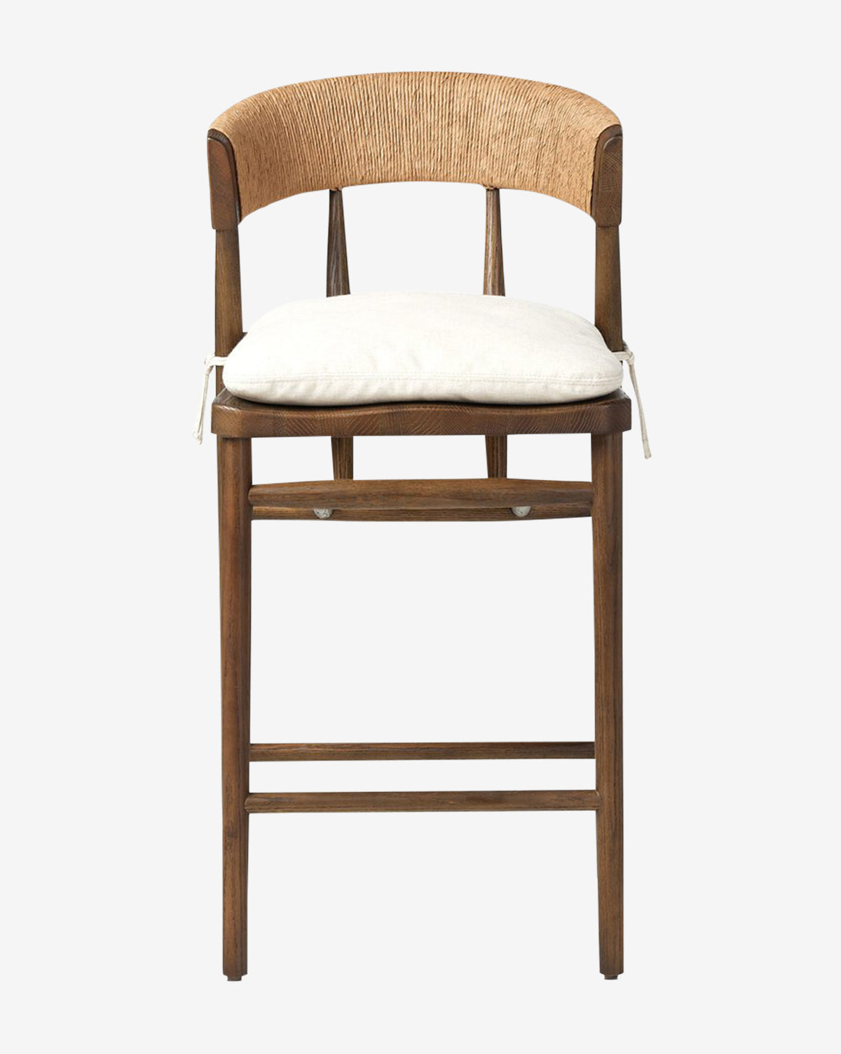 The Ardent Stool by Four Hands boasts a solid oak frame, a curved woven backrest, and a white cushioned seat with ties—ideal for bringing style and comfort to your kitchen bar. Vendixs