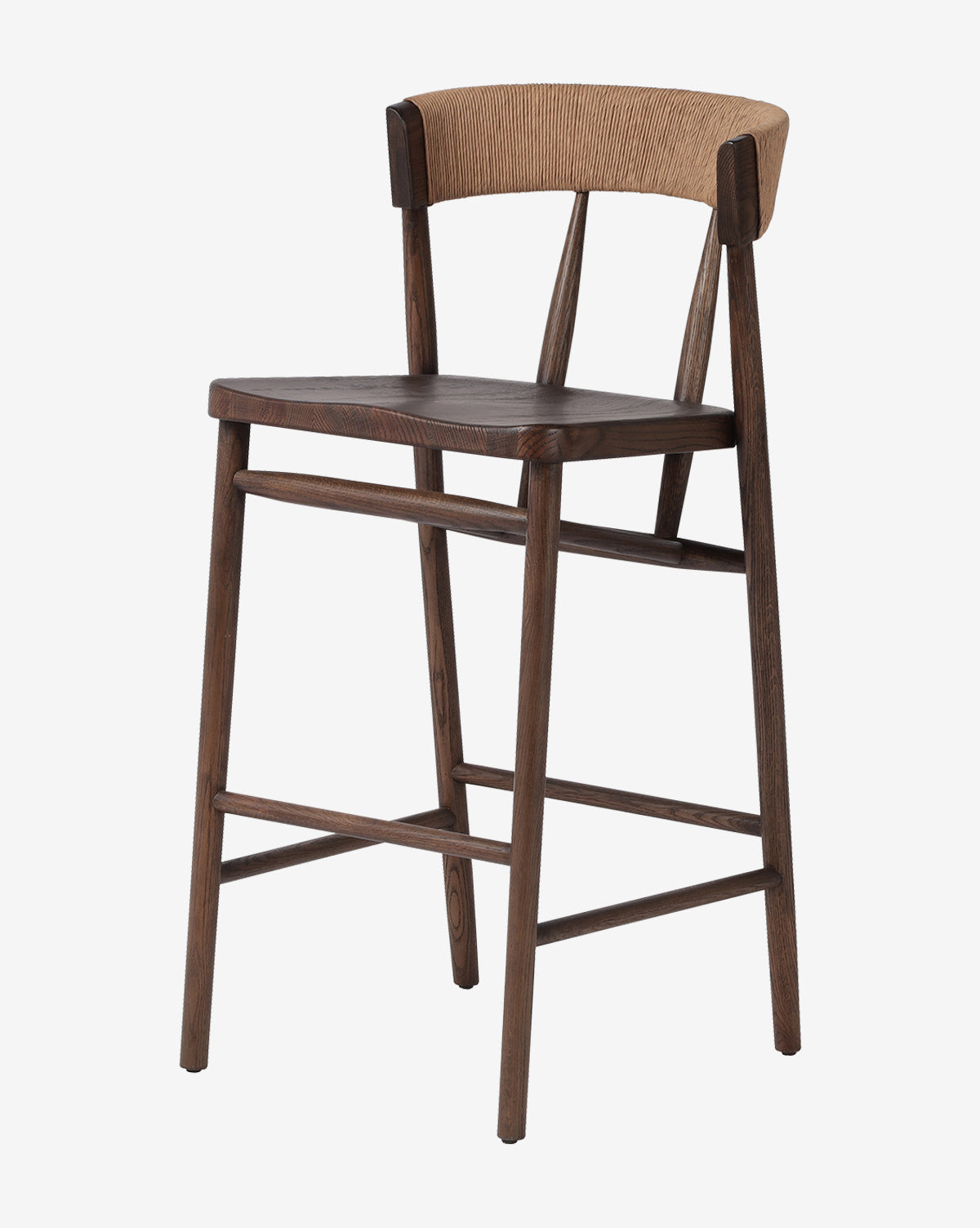 The Ardent Stool by Four Hands is a wooden bar stool with a solid oak frame, dark brown finish, flat seat, and curved backrest with woven cane—ideal for any kitchen bar. Vendixs