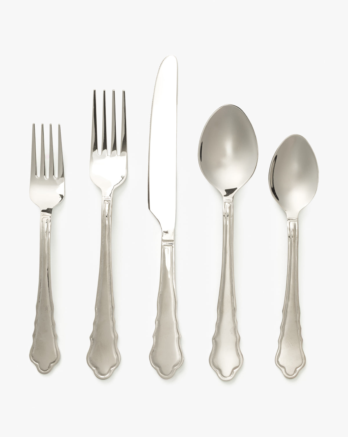 The Artois Flatware Set of 5—two forks, a knife, a tablespoon, and a teaspoon—features matching ornate handles and is arranged side by side on a plain white background by Vendixs
