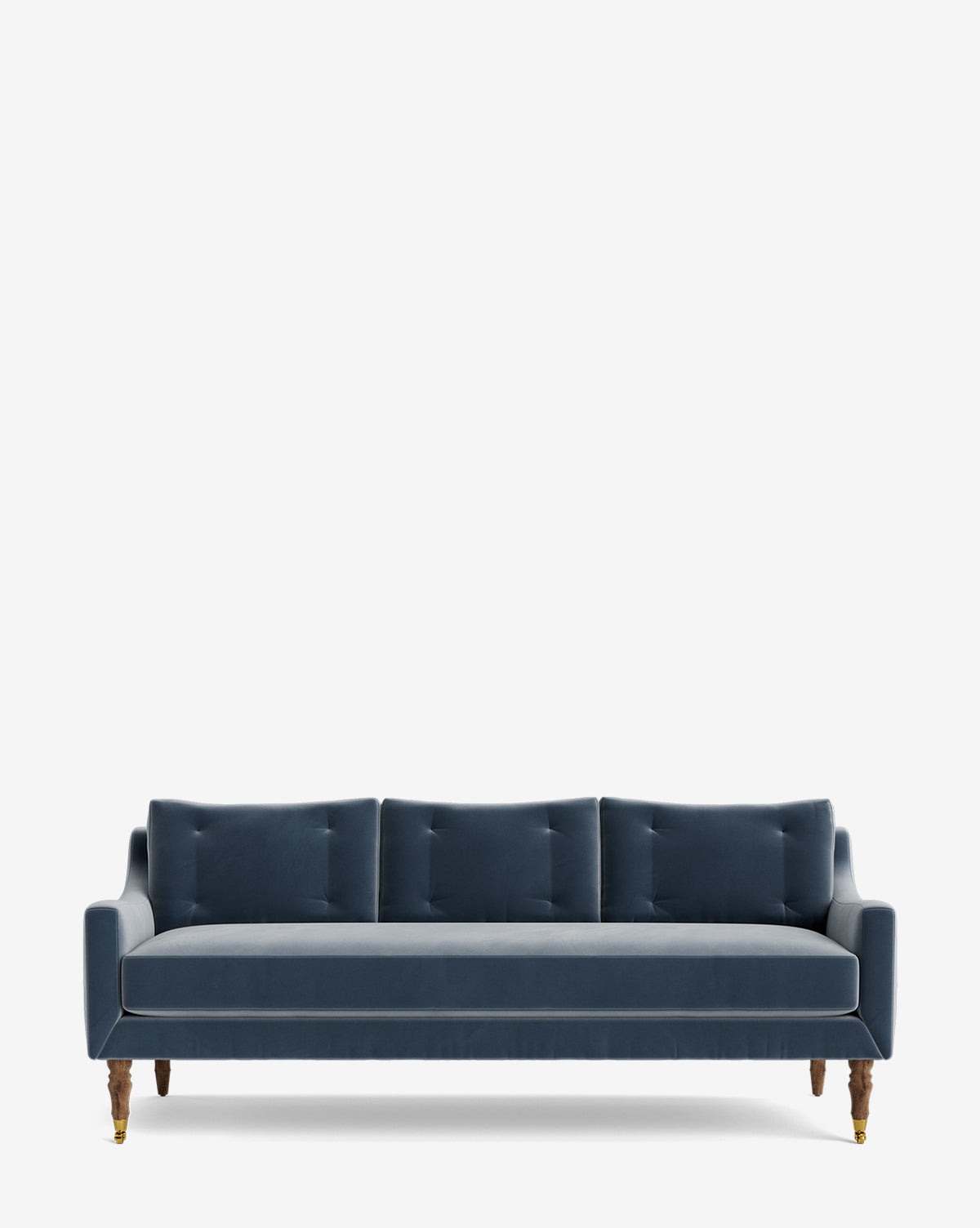 The Barden Sofa 84 showcases a modern navy blue velvet look with three back cushions, slim arms, and reeded wood legs with brass casters, set against a plain white background by Vendixs