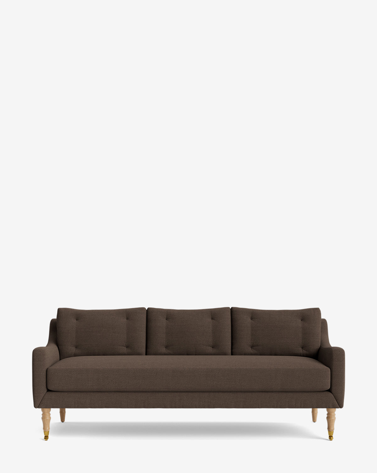 The Barden Sofa 84 is a modern sofa in dark brown with three seat and back cushions, reeded wood legs, and a minimalist design, shown against a plain white background by Vendixs