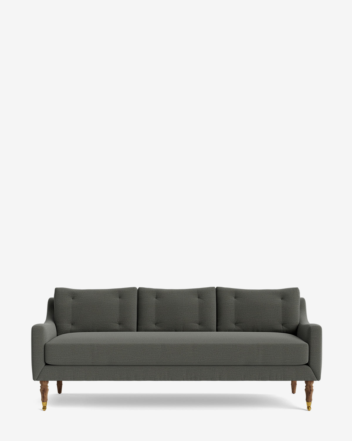 The Barden Sofa 84 is a modern dark grey three-seater with tufted cushions and reeded wood legs, shown against a plain white background by McGee & Co.