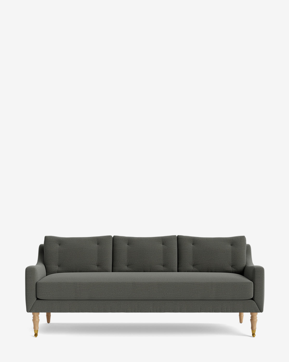 The Barden Sofa 84 features dark gray upholstery, tufted cushions, and reeded wood legs. This three-seat sofa with armrests is showcased against a white background for a modern appearance, by Vendixs