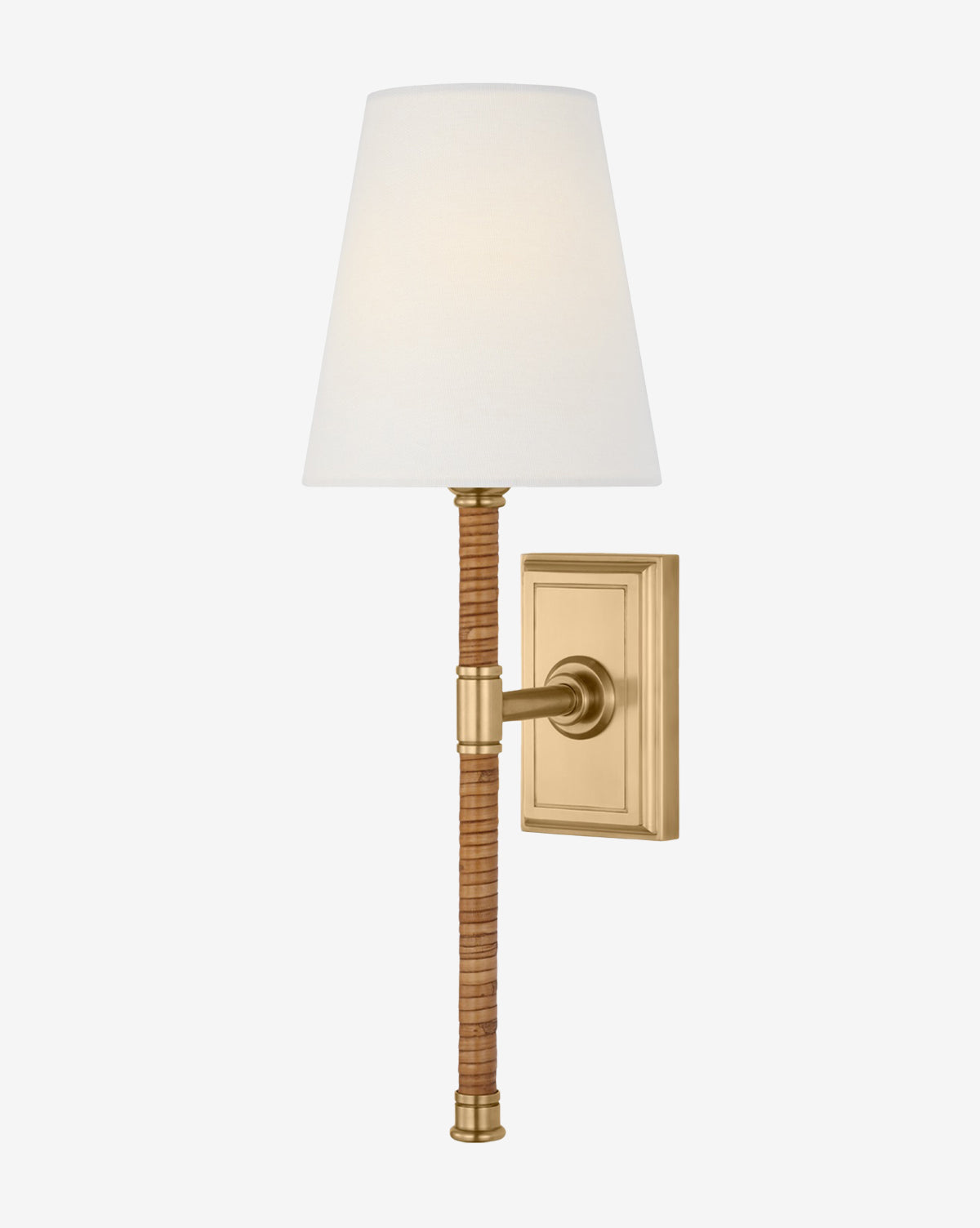 A modern refinement, the Basden Tail Sconce by Visual Comfort & Co. Signature features a gold rattan frame, rectangular backplate, slender brown rattan-wrapped stem, and a white tapered lampshade. Vendixs