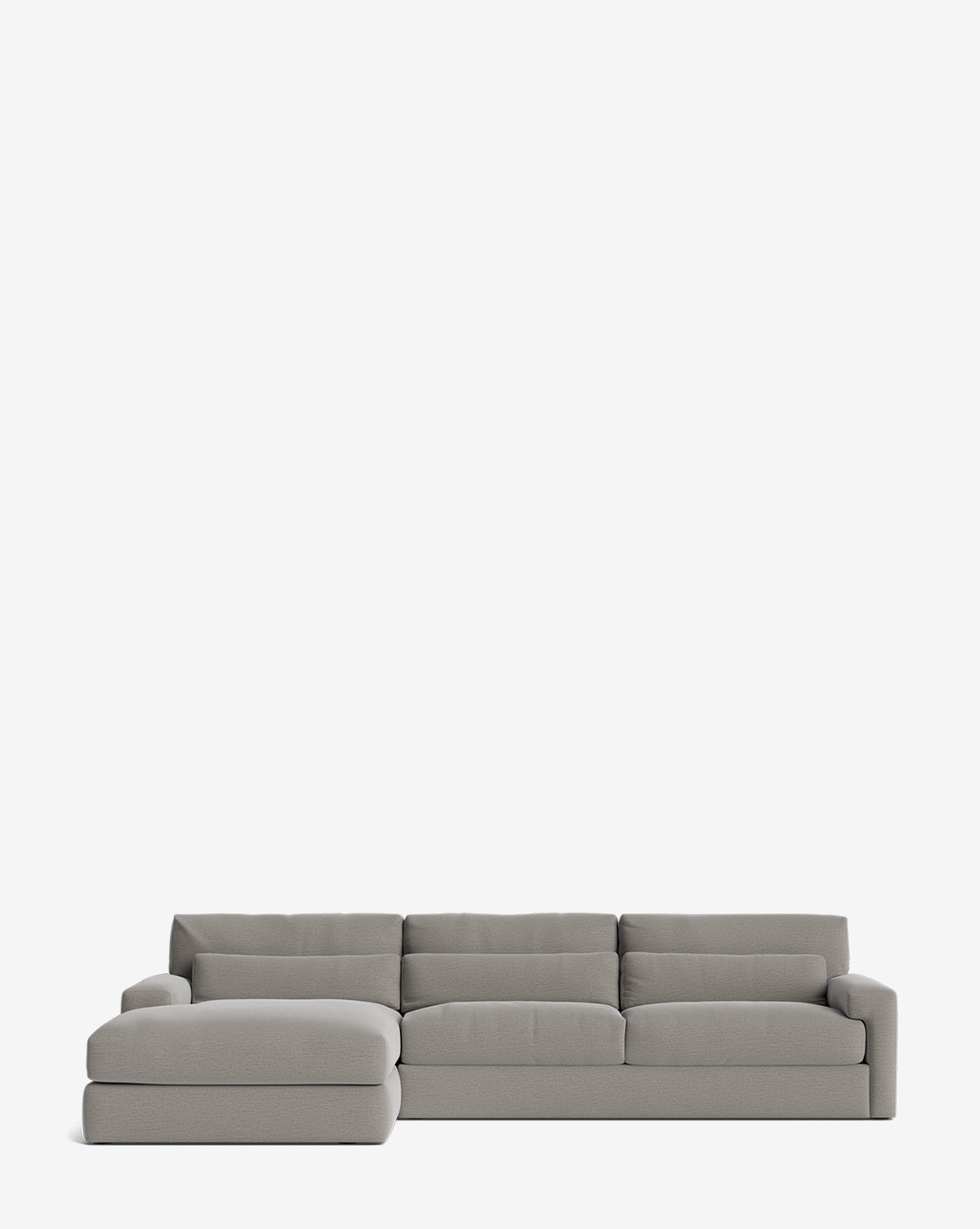 The Beckstead Chaise Sectional 128 by Community features three seats and a left-facing chaise in light gray, set against a white background—a customizable, stylish, and comfortable addition to any modern living space. Vendixs