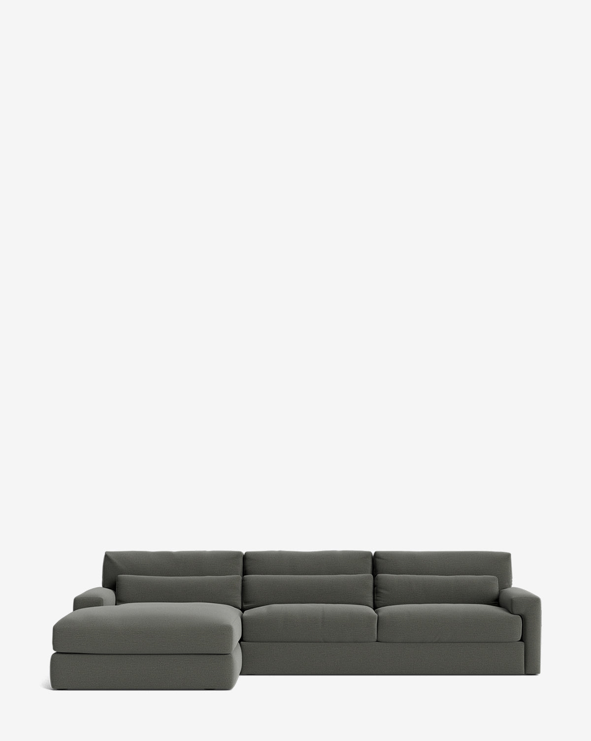 The Beckstead Chaise Sectional 128 by Community features a modern, dark gray design with a low profile, clean lines, and a left-side chaise lounge extension set against a plain white background. Vendixs