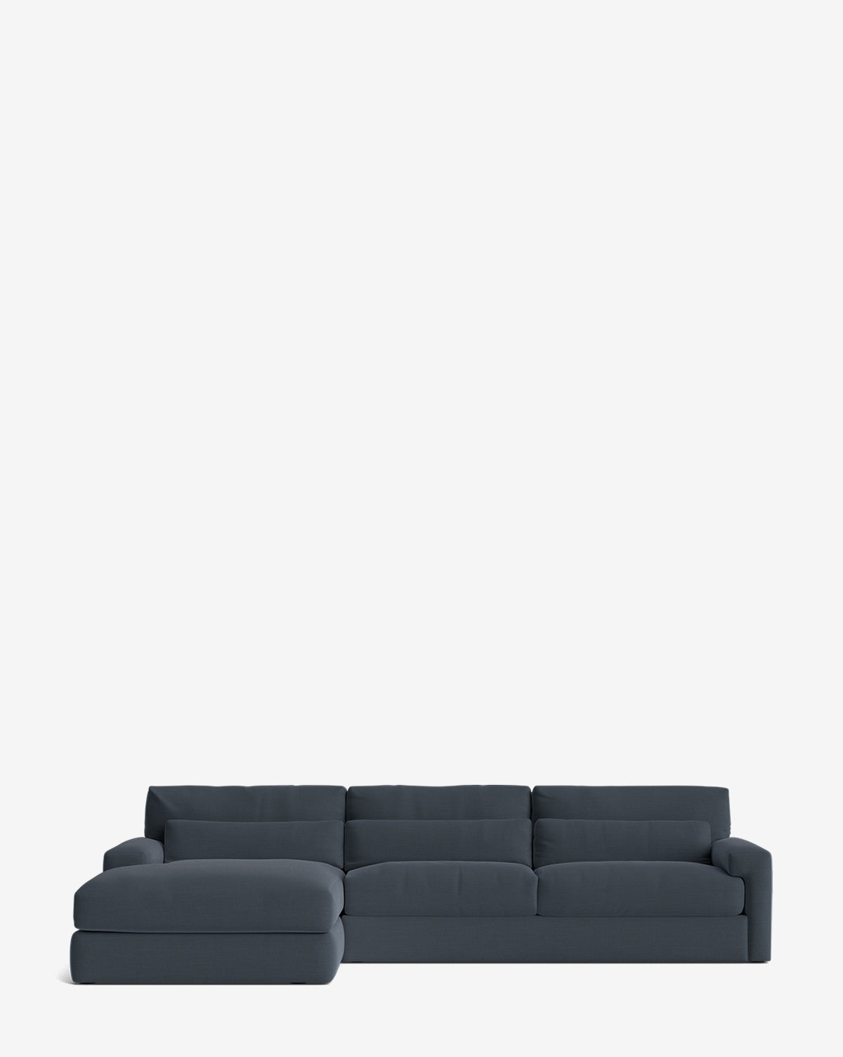 The Community Beckstead Chaise Sectional 128 is a modern, handcrafted dark gray sectional with plush cushions and a minimalist design, featuring a left-facing lounge and shown on a plain white background. Vendixs