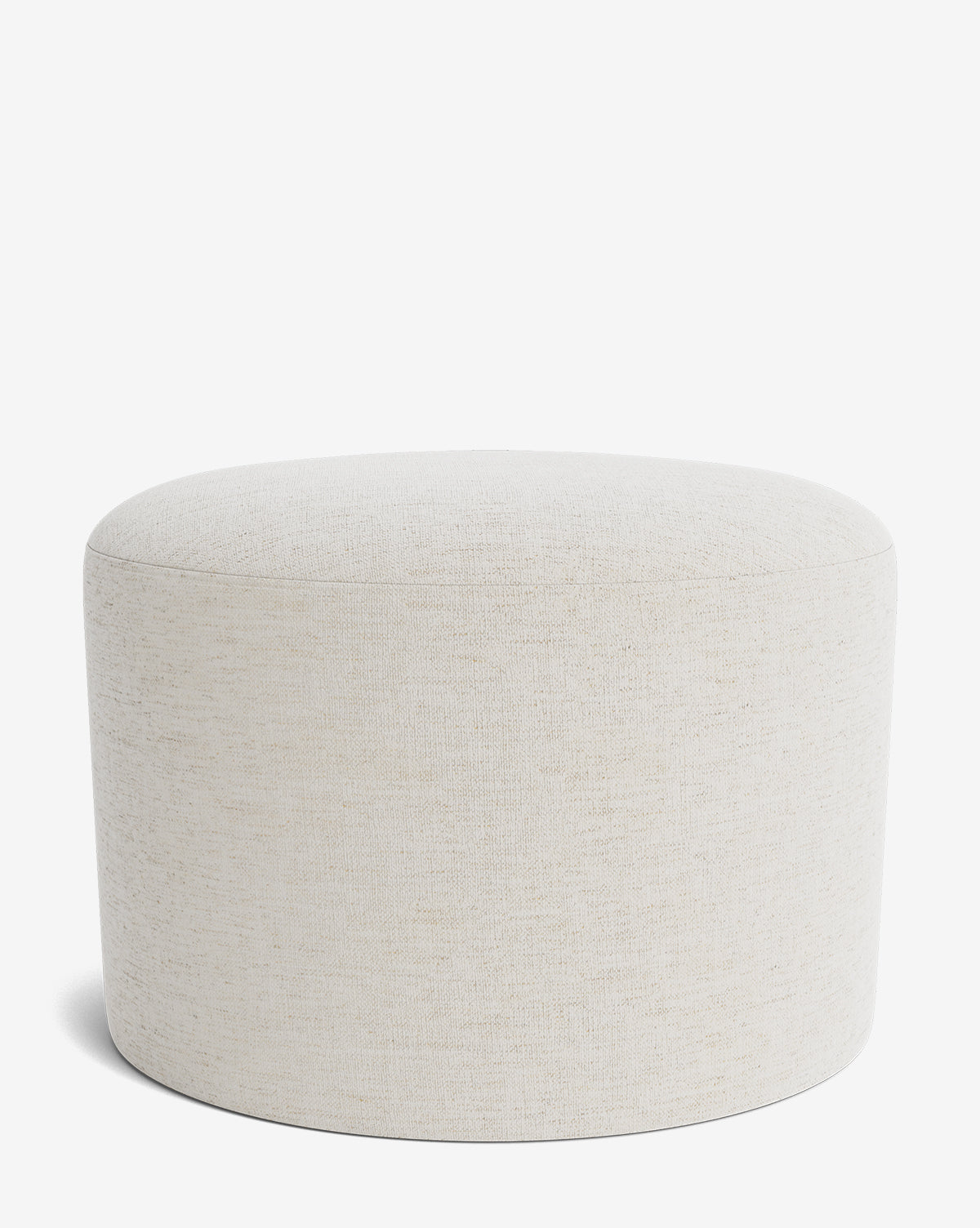The Makerspalm Bellamy Ottoman is a round, light beige upholstered piece with a simple, modern design and smooth lines, set against a plain white background. Vendixs
