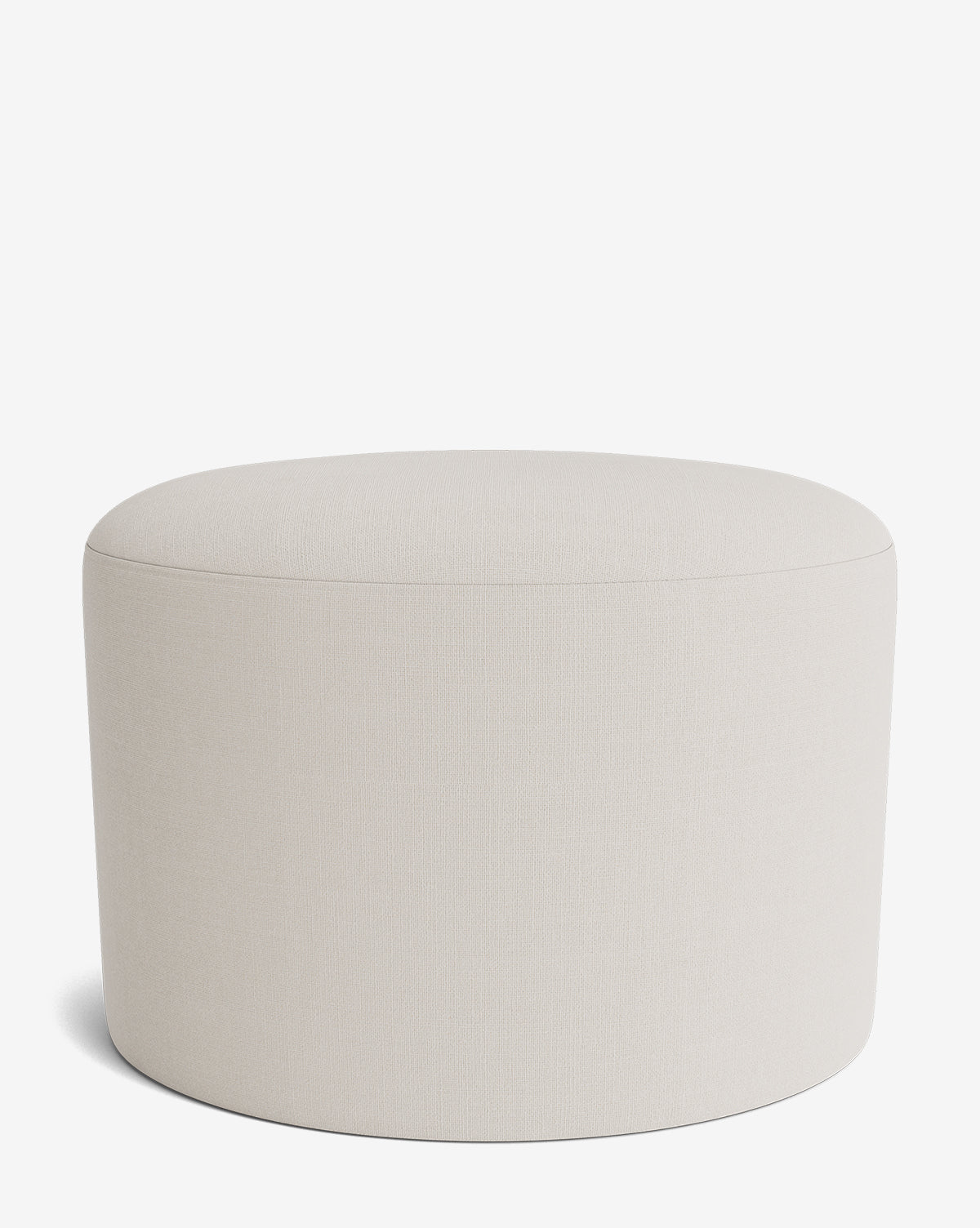The Makerspalm Bellamy Ottoman is a round, light beige piece with a smooth surface set on a white background—an elegant and versatile addition to any living space. Vendixs
