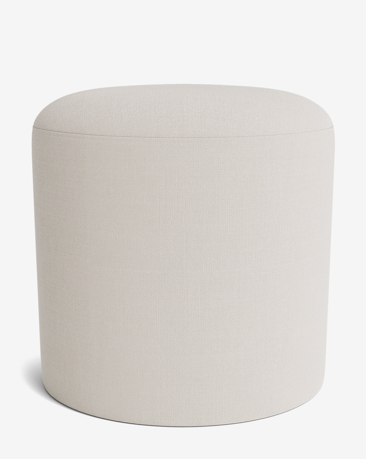 The Makerspalm Bellamy Ottoman is a minimalist, round ottoman in light beige fabric with a seamless surface and no visible legs or details, perfect for modern spaces. Vendixs