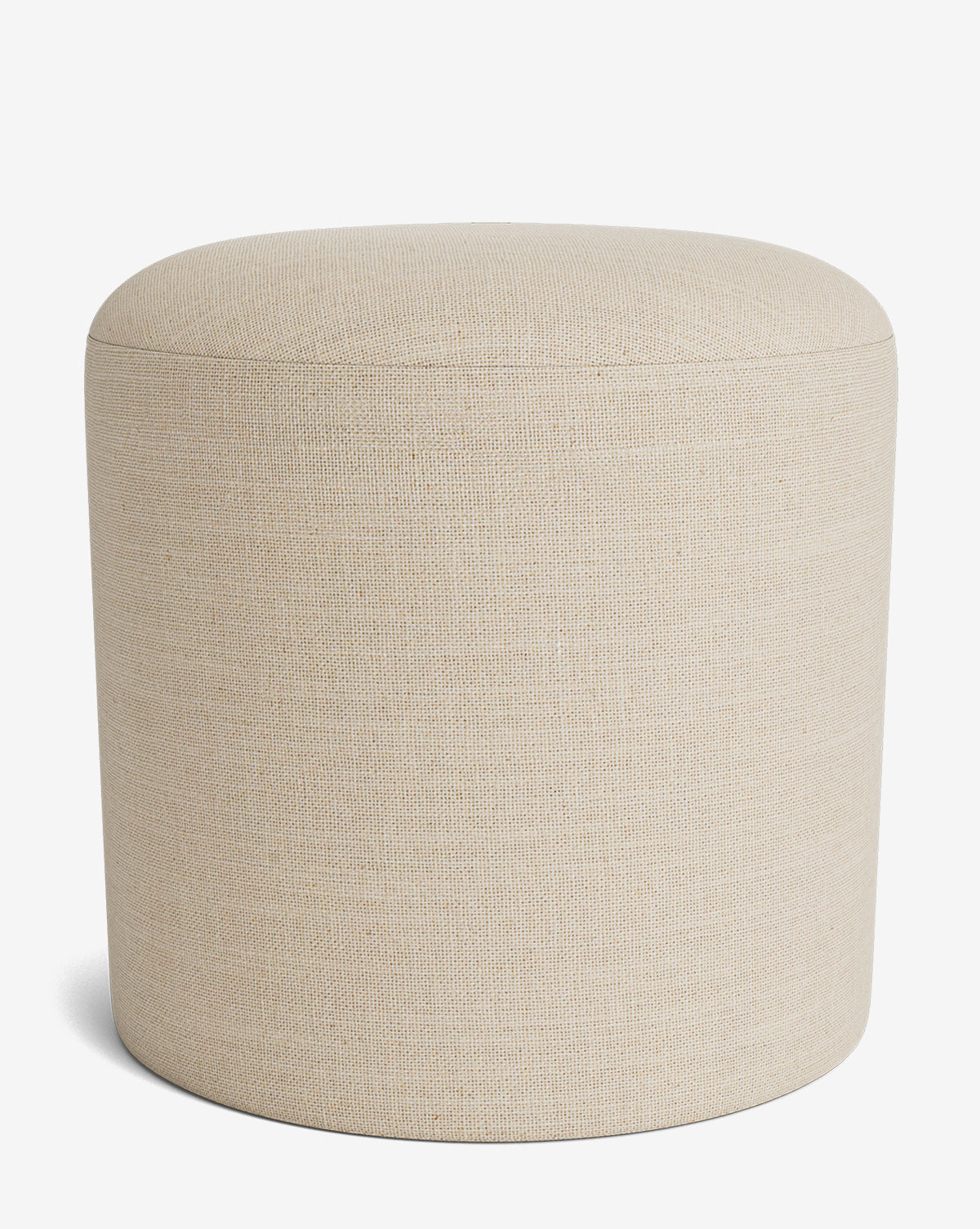The Makerspalm Bellamy Ottoman is a round, beige fabric piece with a smooth top and cylindrical shape, shown against a plain white background. Vendixs