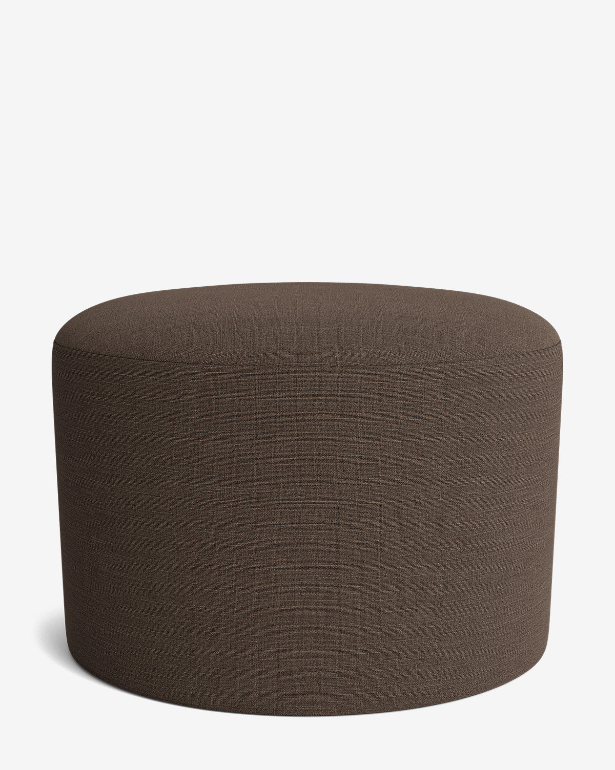 The Makerspalm Bellamy Ottoman showcases a round, brown upholstered fabric design, adding versatile style to any space. Vendixs