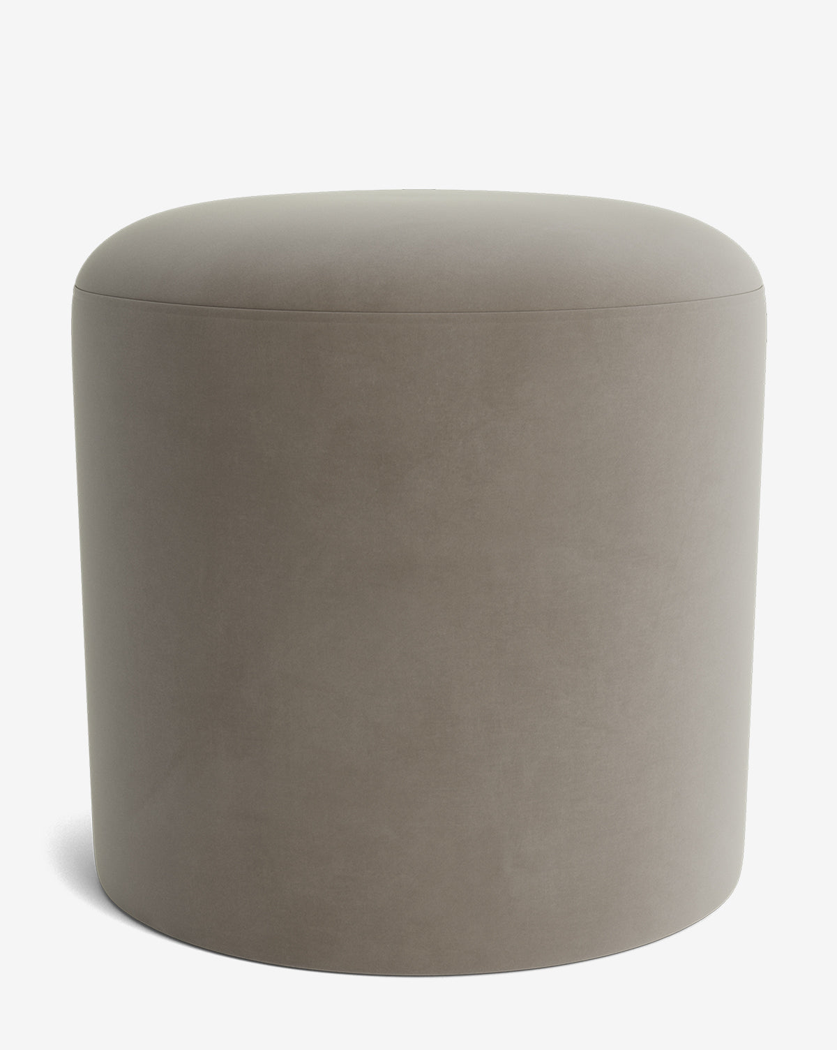 The Makerspalm Bellamy Ottoman features smooth taupe upholstery in a round, minimalist design with no visible legs or decorations, shown against a plain white background. Vendixs