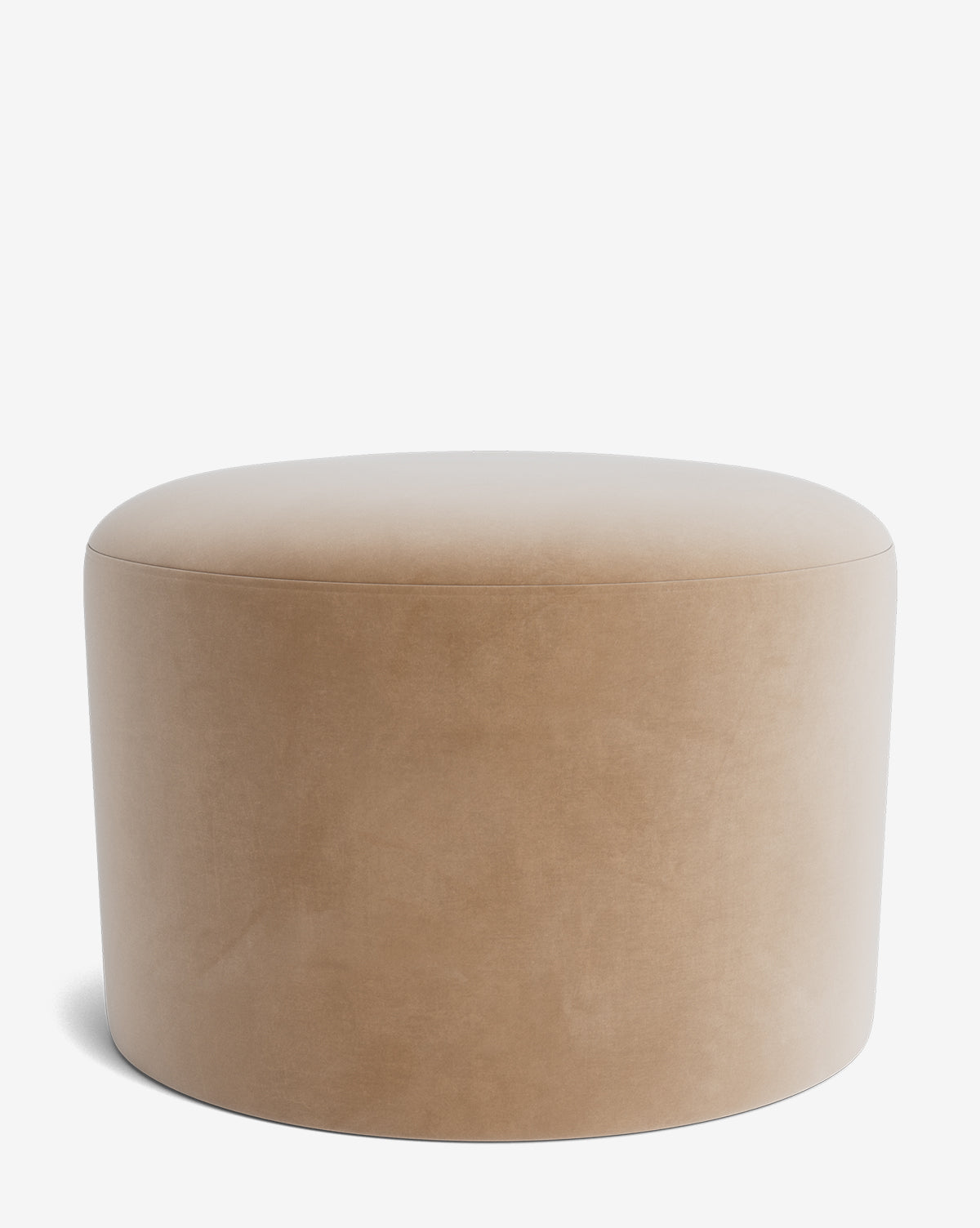 The Makerspalm Bellamy Ottoman is a round, beige ottoman with a smooth, upholstered surface and no visible legs, shown against a plain white background by Vendixs