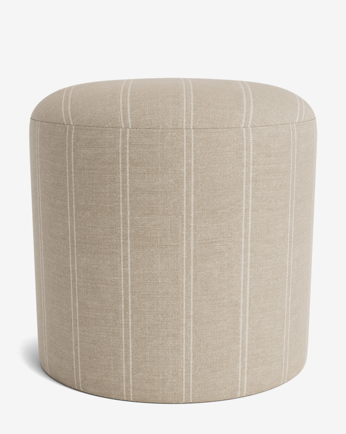 The Bellamy Ottoman by Makerspalm is a beige, round upholstered ottoman with subtle vertical white stripes, shown against a plain white background. This versatile piece adds elegance to any space. Vendixs