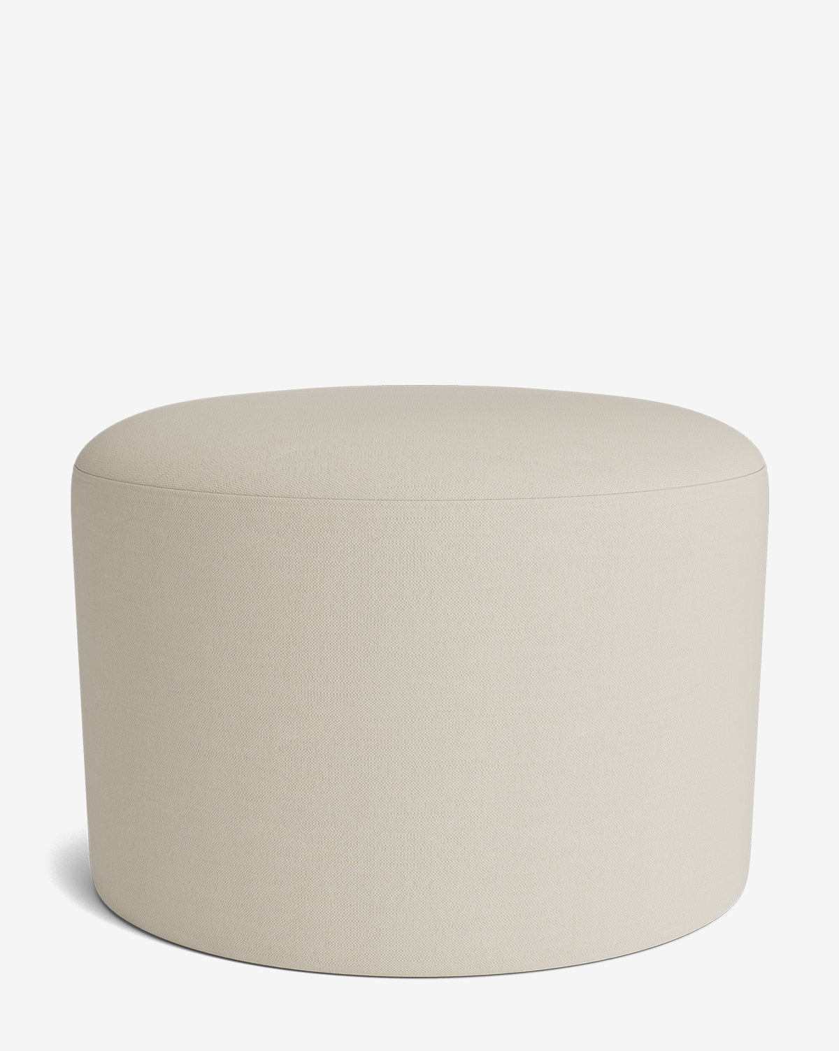 The Makerspalm Bellamy Ottoman is a round, beige ottoman with a smooth upholstered surface and no visible legs, shown on a plain white background. This stylish piece adds versatile comfort to any room by Vendixs