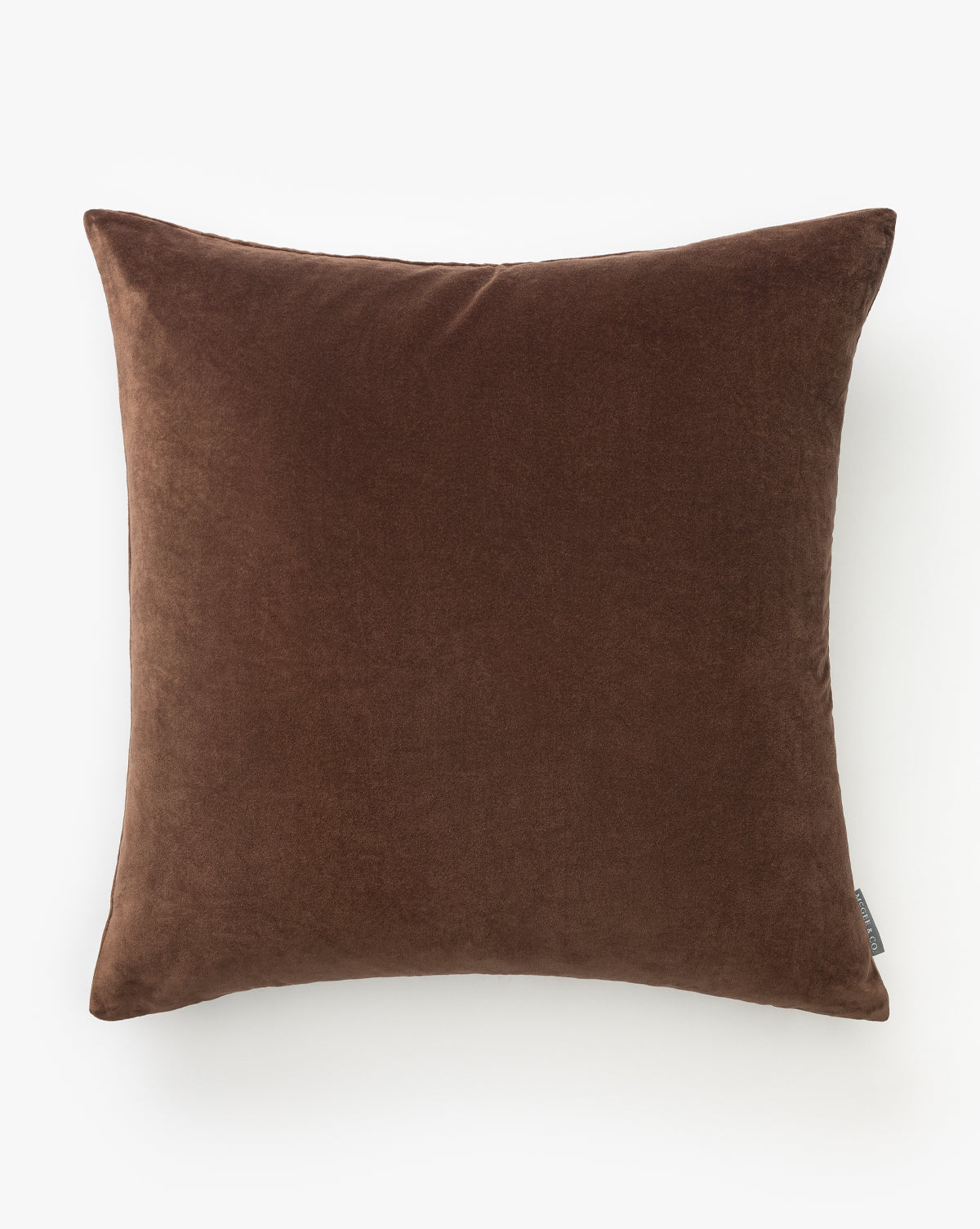 The Bellevue Velvet Pillow Cover, in a rich brown with a soft velvet texture, is displayed against a white background—the perfect decorative accent to elevate any space, by Vendixs