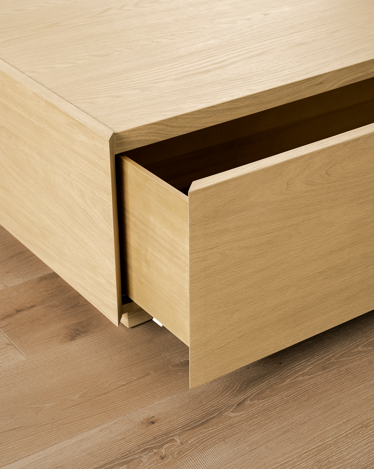 The handle-free, minimalist design perfectly complements the modern Bentley Coffee Table aesthetic, by Vendixs