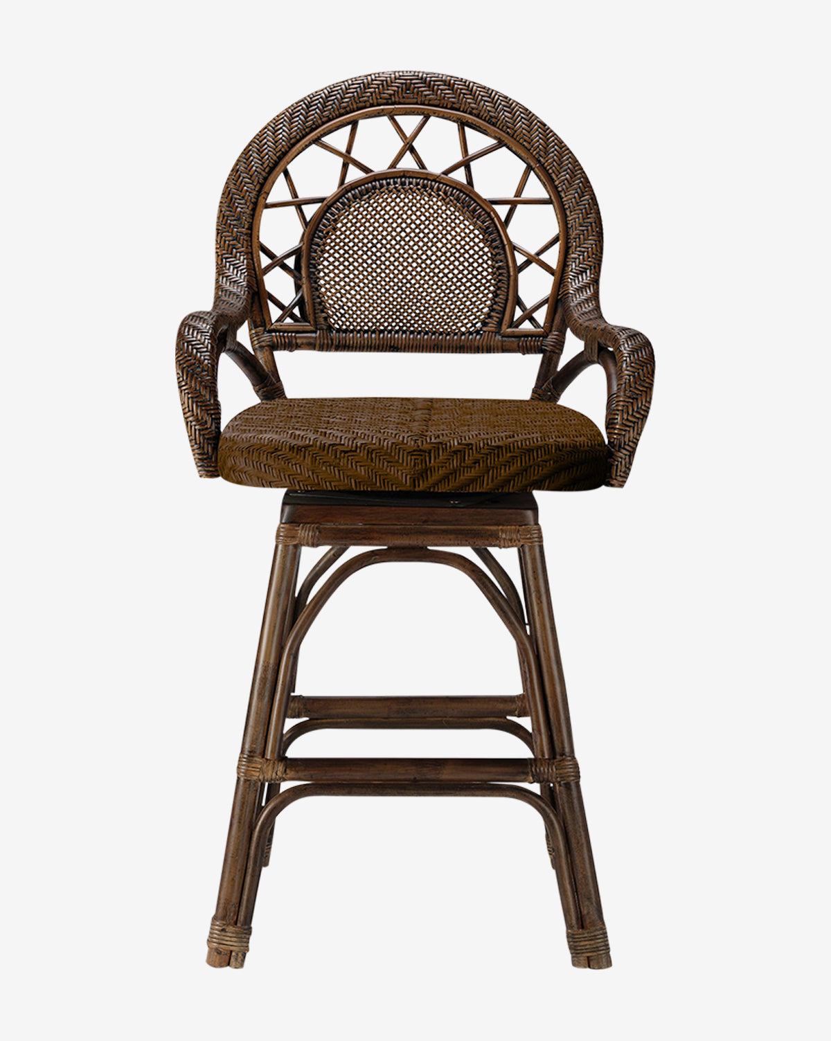The Brodie Counter Stool by Made Goods showcases a vintage-inspired style with a handwoven rattan seat, curved backrest, rounded arms, cushioned seat, and swivel base with four wicker legs and a footrest. Vendixs