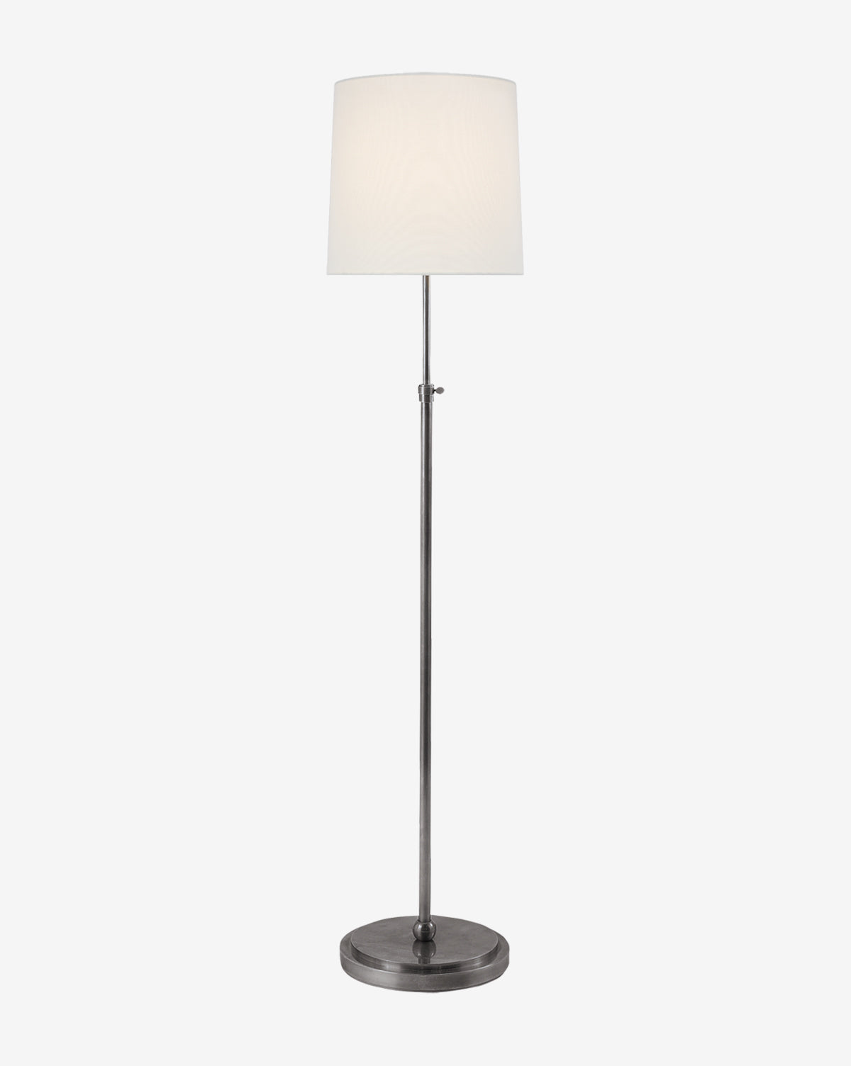 The Bryant Floor Lamp features a slim metal base and a round white linen shade, offering a classic look against a plain white background, by Vendixs