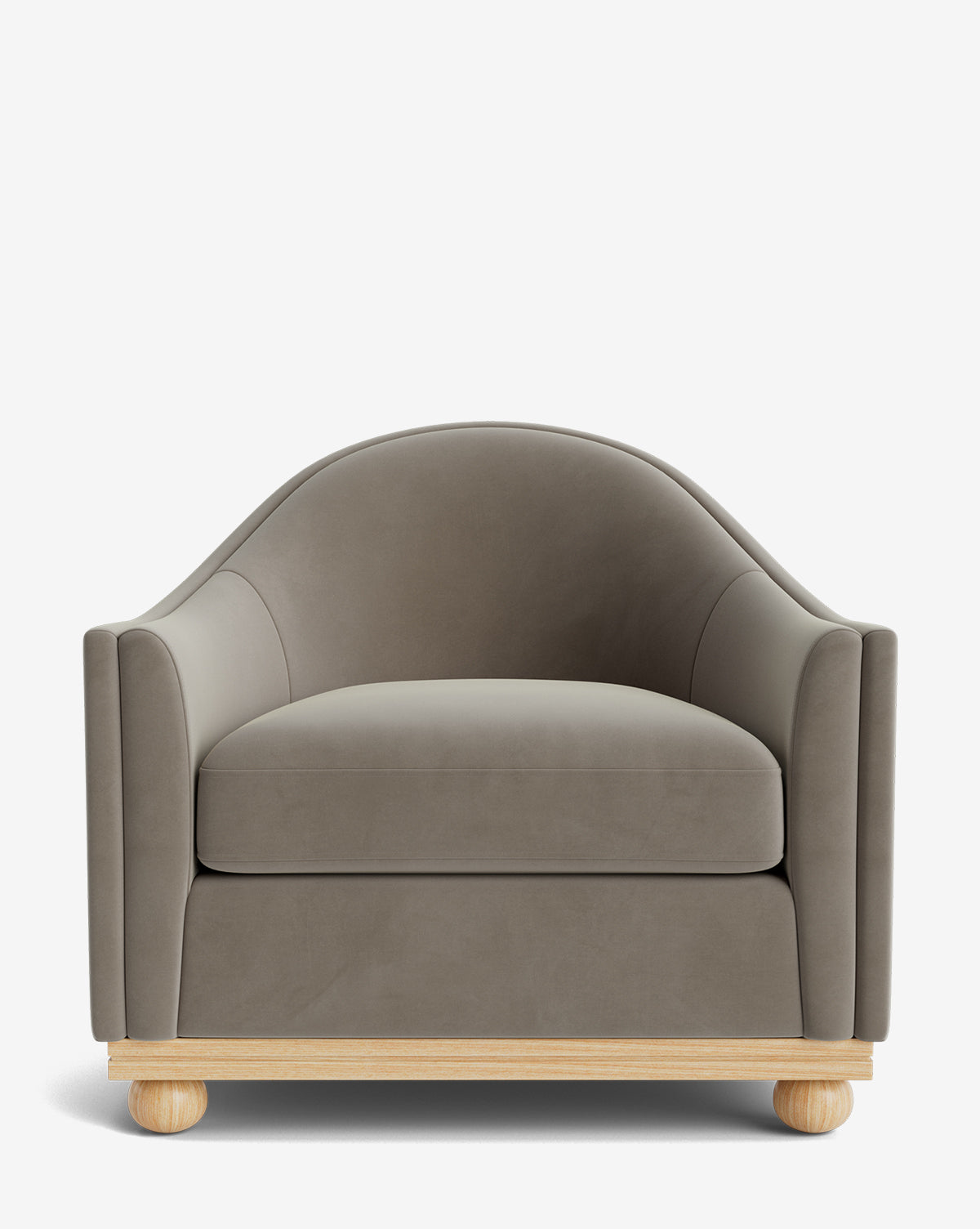 The Test Bunnell Lounge Chair (Copy) is a modern, taupe armchair with curved armrests, plush cushions, a rounded backrest, light wooden legs, and a customizable minimalist contemporary design by McGee & Co.