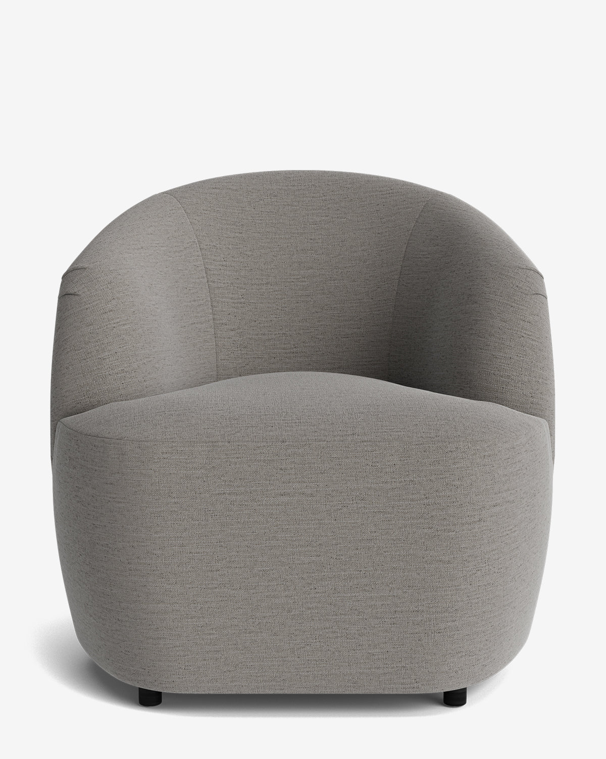 The Byron Chair is a modern seat with a rounded curved back, upholstered in light gray fabric. It features subtle seams, a wide seat, and small black legs, all set against a plain white background, by McGee & Co.