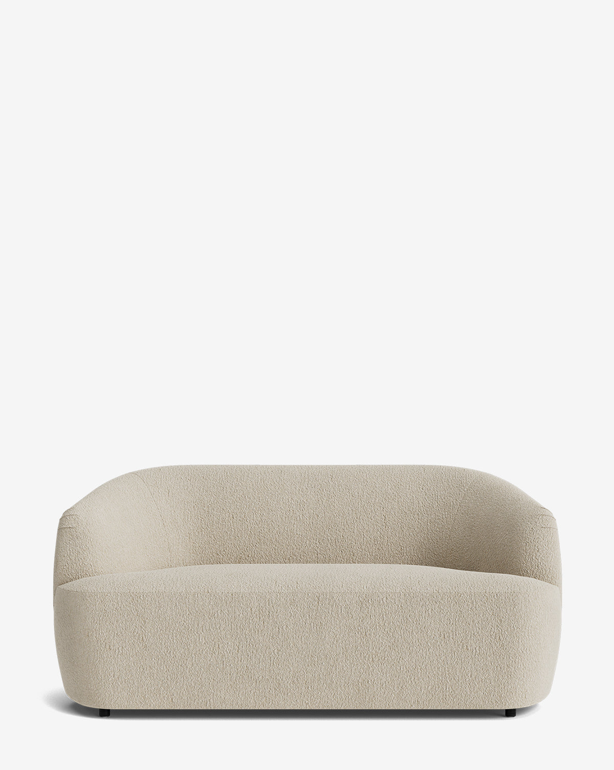 The Byron Settee 68 showcases a modern, minimalist design with rounded edges, a low backrest, and textured beige upholstery, set against a plain white background by McGee & Co.